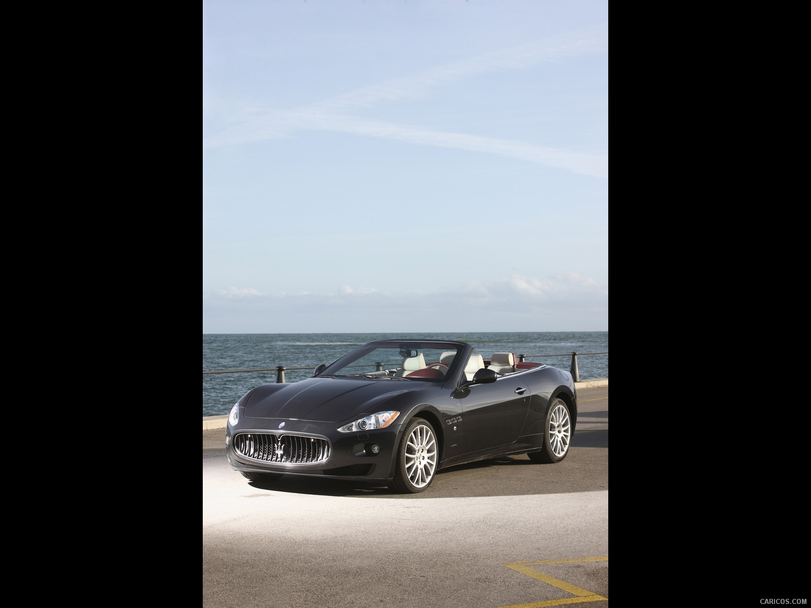 2011 Maserati GranCabrio - Top Down - Front Left Quarter View Photo, #7 of 59