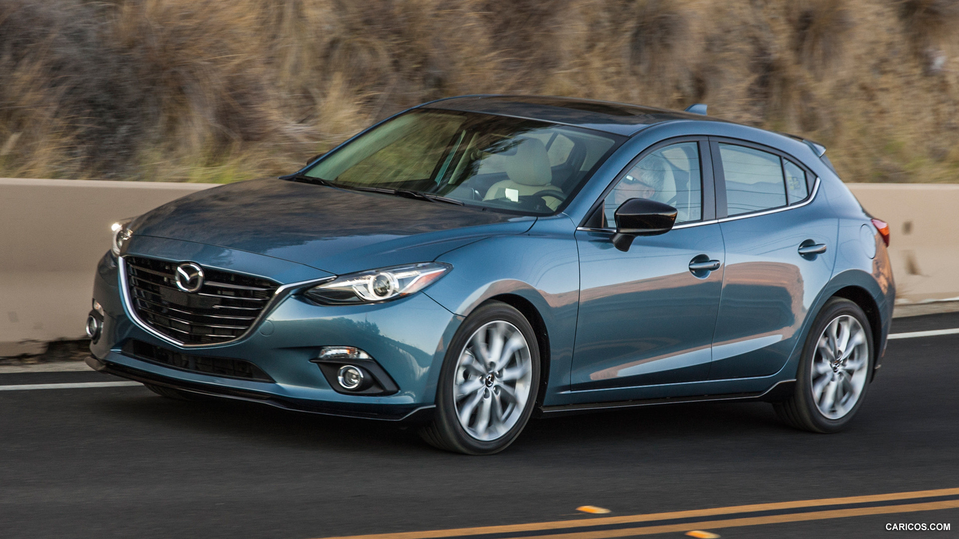 2015 Mazda 3 5D s Touring 6MT (Blue Reflex) - Front | Caricos