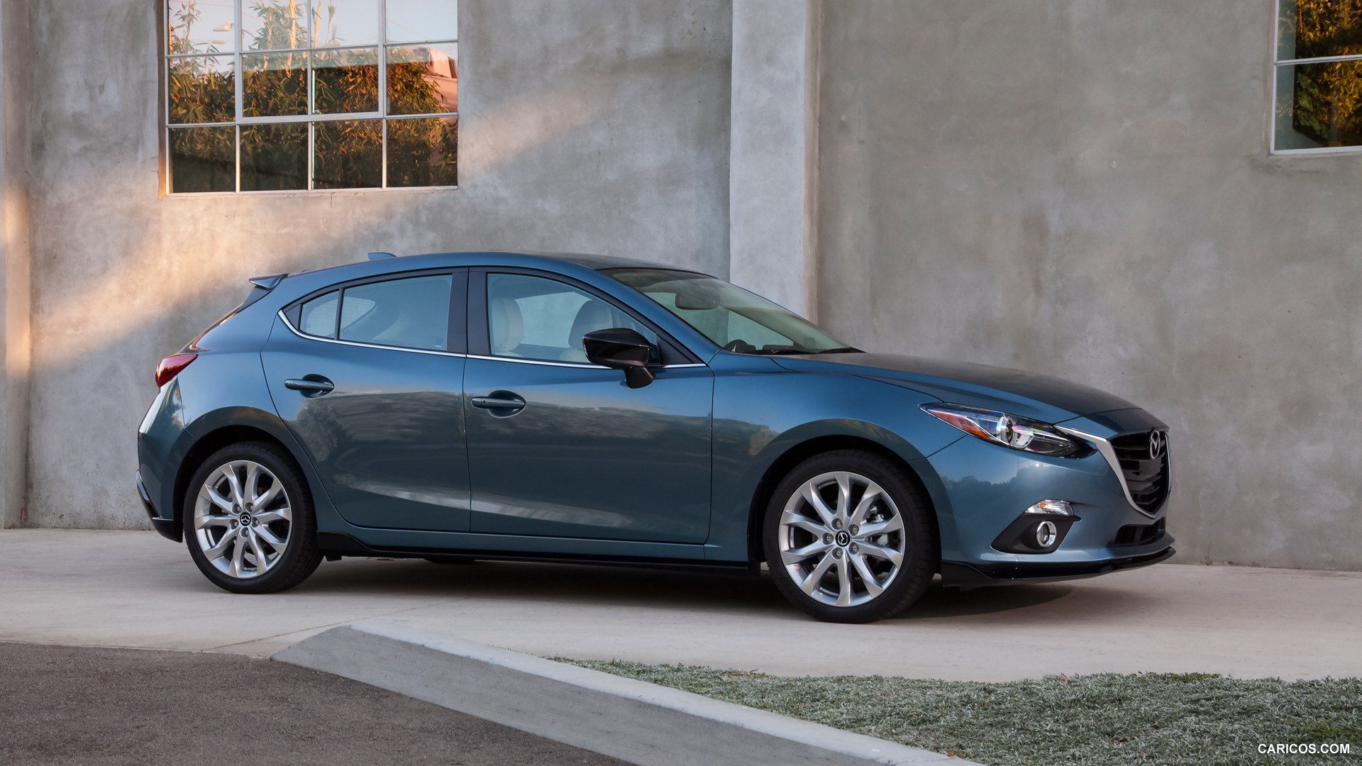 2015 Mazda 3 5D s Touring 6MT (Blue Reflex) - Side | Caricos