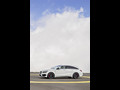 2015 Mercedes-Benz CLA 45 AMG Shooting Brake (Calcite White) - Side