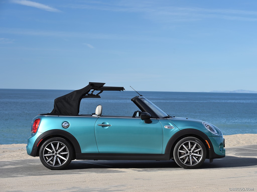 2016 MINI Cooper S Convertible (Color: Caribbean Aqua Metallic) - Top In Action - Side