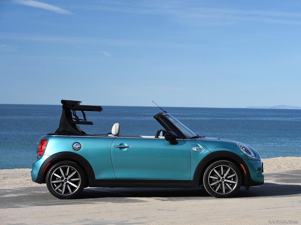 2016 MINI Cooper S Convertible (Color: Caribbean Aqua Metallic) - Top In Action - Side