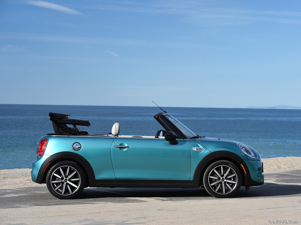 2016 MINI Cooper S Convertible (Color: Caribbean Aqua Metallic) - Top In Action - Side