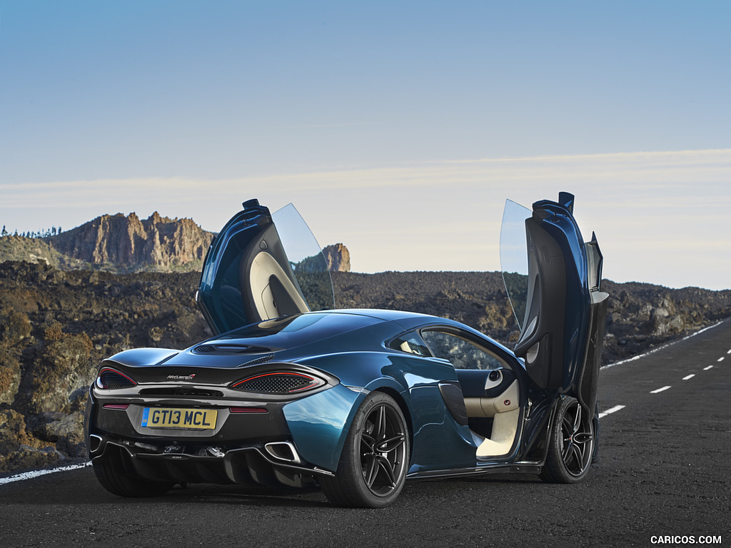 2017 McLaren 570GT - Doors Up - Rear Three-Quarter