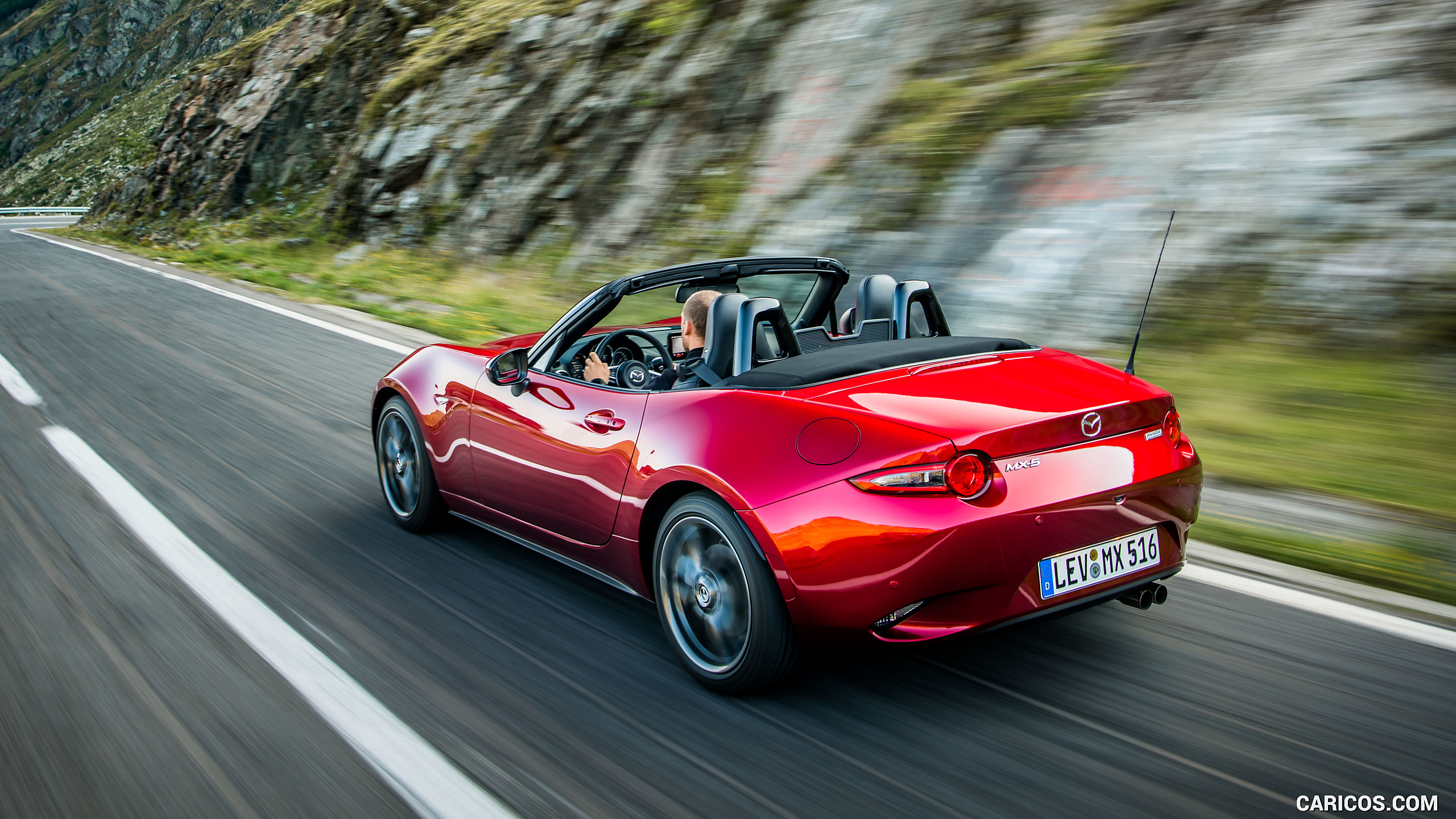 2019 Mazda MX-5 Roadster (Color: Soul Red Crystal) - Rear Three-Quarter, #17 of 101