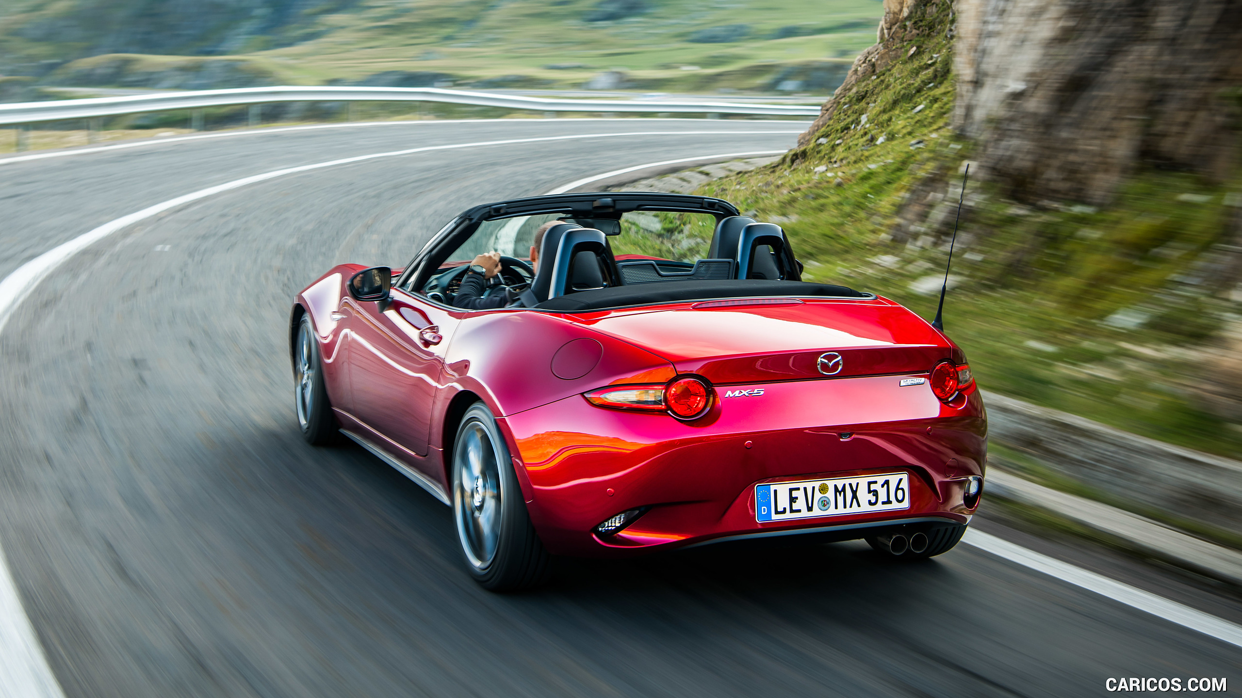 2019 Mazda MX-5 Roadster (Color: Soul Red Crystal) - Rear Three-Quarter, #18 of 101