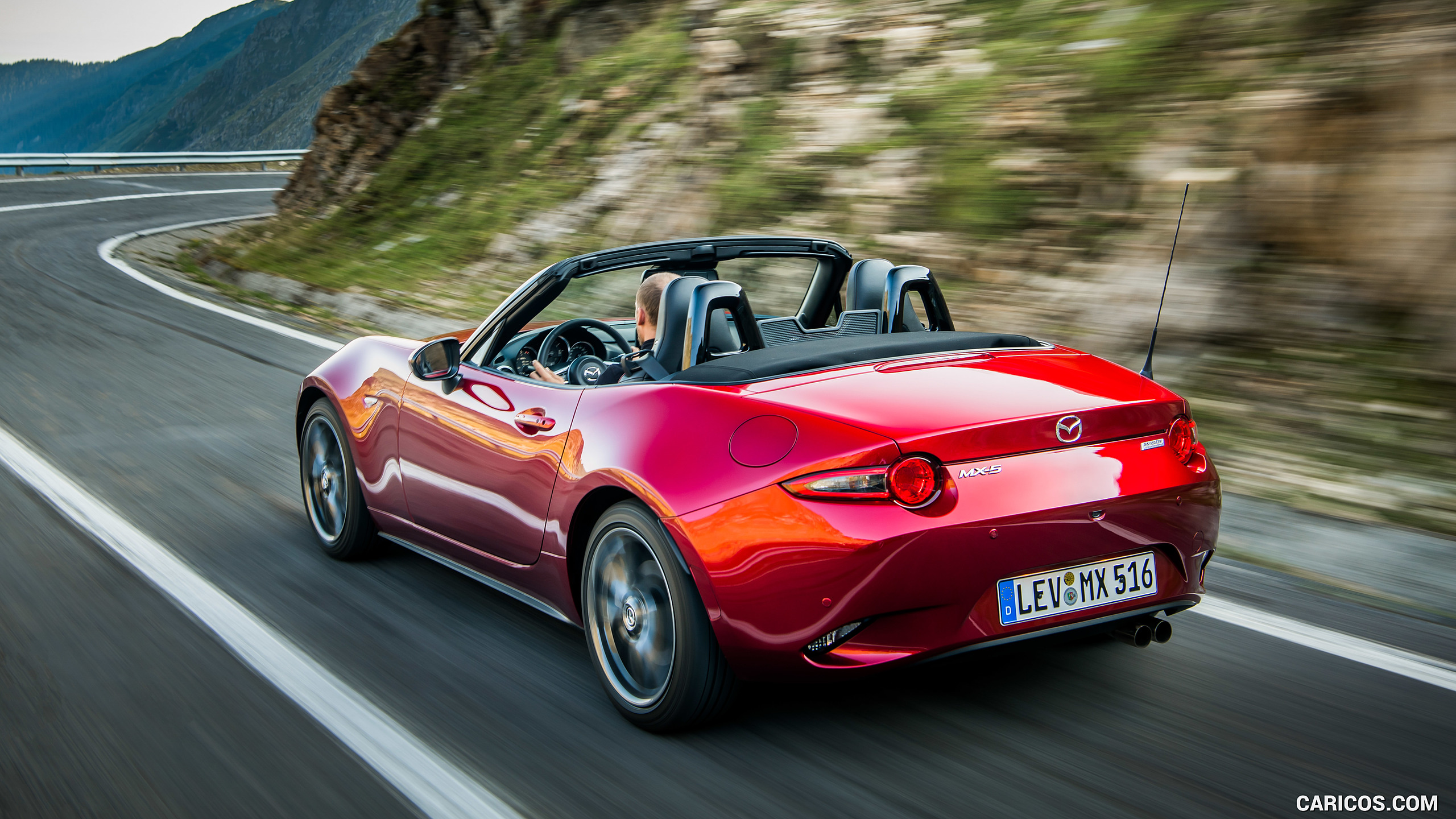 2019 Mazda MX-5 Roadster (Color: Soul Red Crystal) - Rear Three-Quarter, #19 of 101