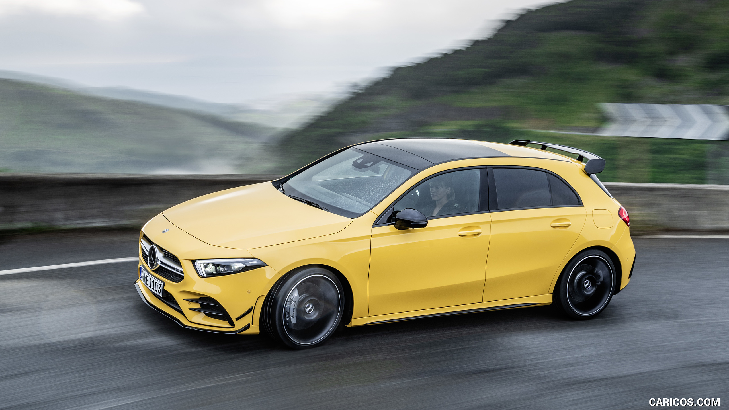 2019 Mercedes-AMG A 35 4MATIC (Color: Sun Yellow) - Front Three-Quarter, #1 of 30