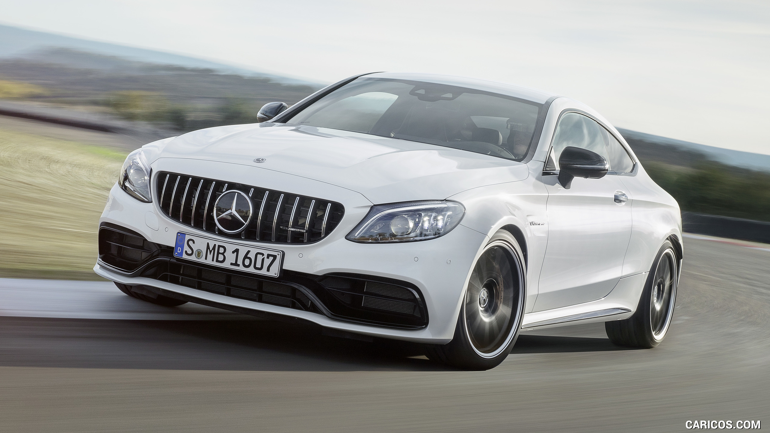 2019 Mercedes-AMG C 63 S Coupe with Night package and Carbon-package II (Color: Designo Diamond White Bright) - Front, #4 of 106