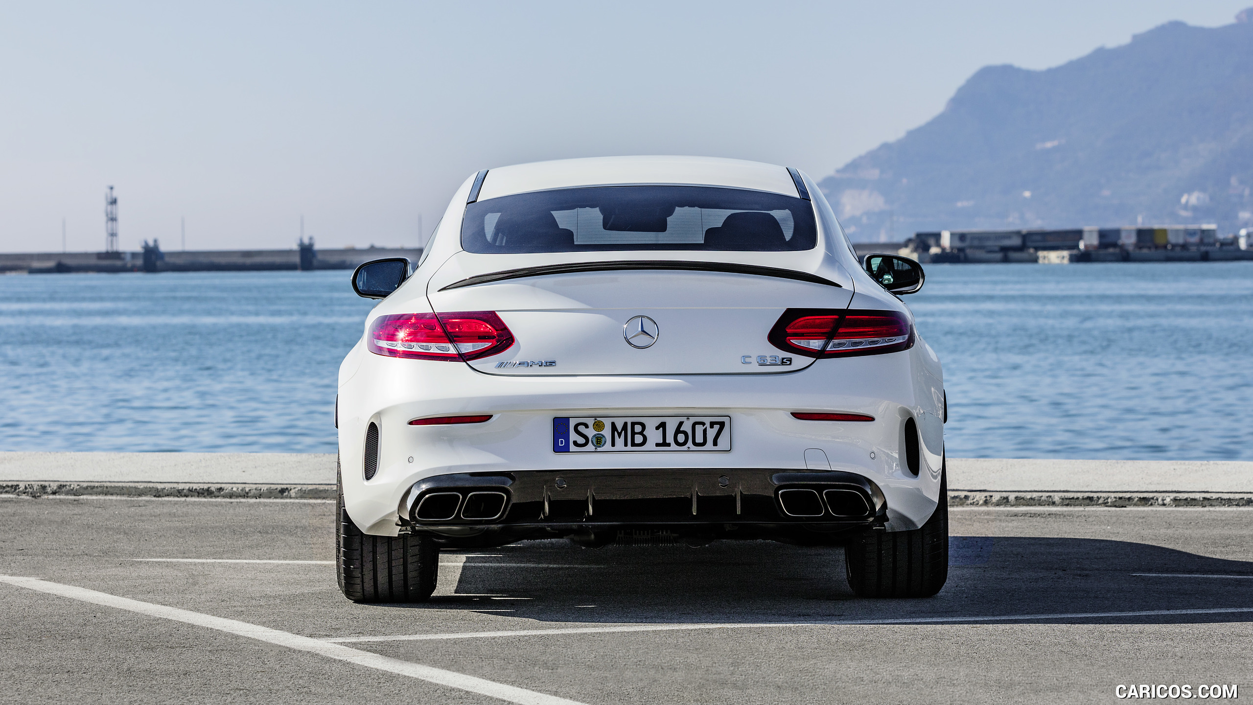 2019 Mercedes-AMG C 63 S Coupe with Night package and Carbon-package II (Color: Designo Diamond White Bright) - Rear, #18 of 106