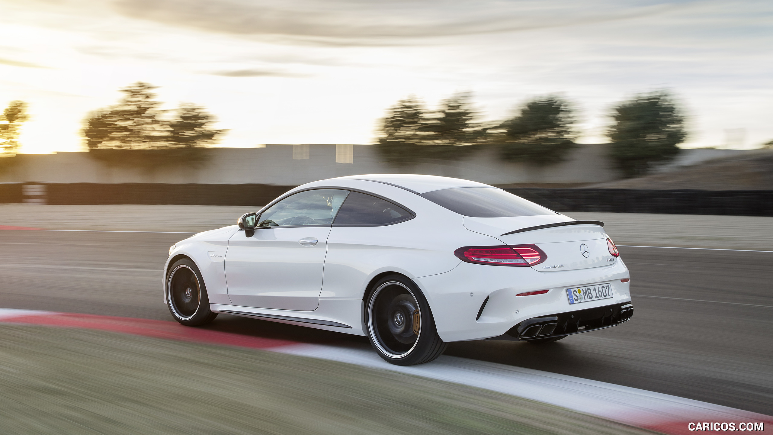 2019 Mercedes-AMG C 63 S Coupe with Night package and Carbon-package II (Color: Designo Diamond White Bright) - Rear Three-Quarter, #2 of 106