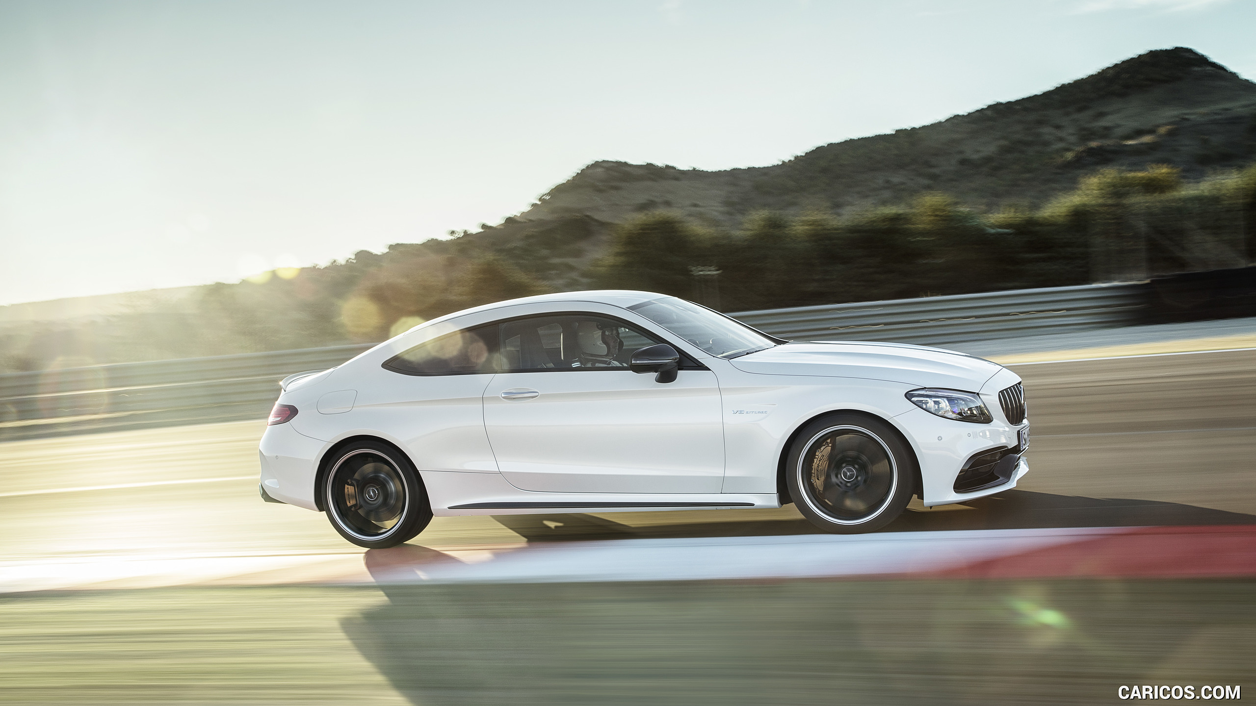 2019 Mercedes-AMG C 63 S Coupe with Night package and Carbon-package II (Color: Designo Diamond White Bright) - Side, #6 of 106