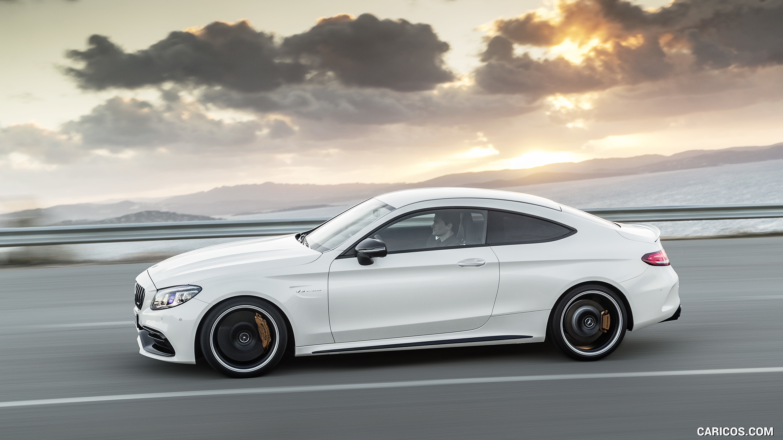 2019 Mercedes-AMG C 63 S Coupe with Night package and Carbon-package II (Color: Designo Diamond White Bright) - Side, #7 of 106