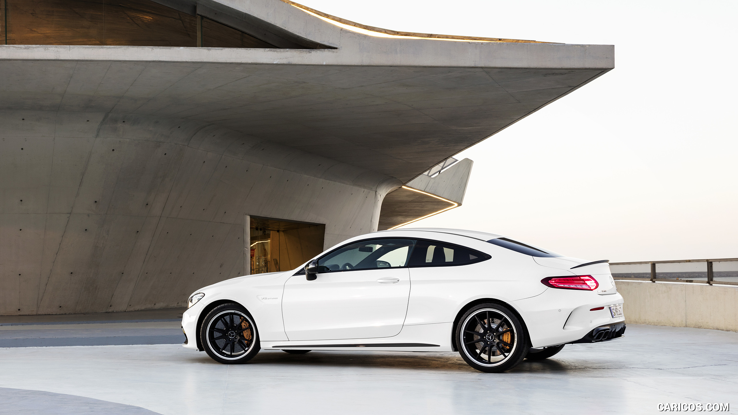 2019 Mercedes-AMG C 63 S Coupe with Night package and Carbon-package II (Color: Designo Diamond White Bright) - Side, #14 of 106
