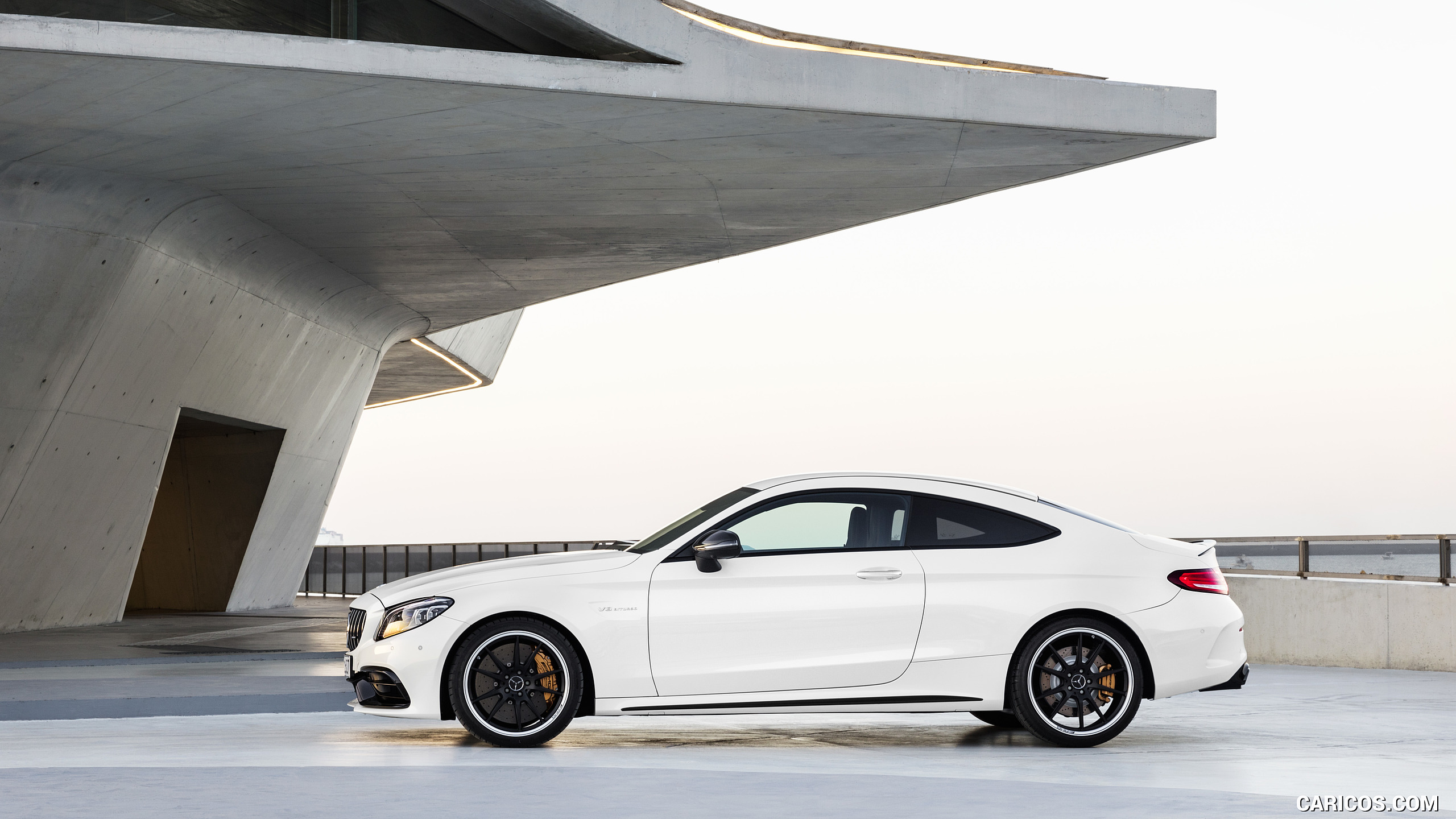 2019 Mercedes-AMG C 63 S Coupe with Night package and Carbon-package II (Color: Designo Diamond White Bright) - Side, #15 of 106