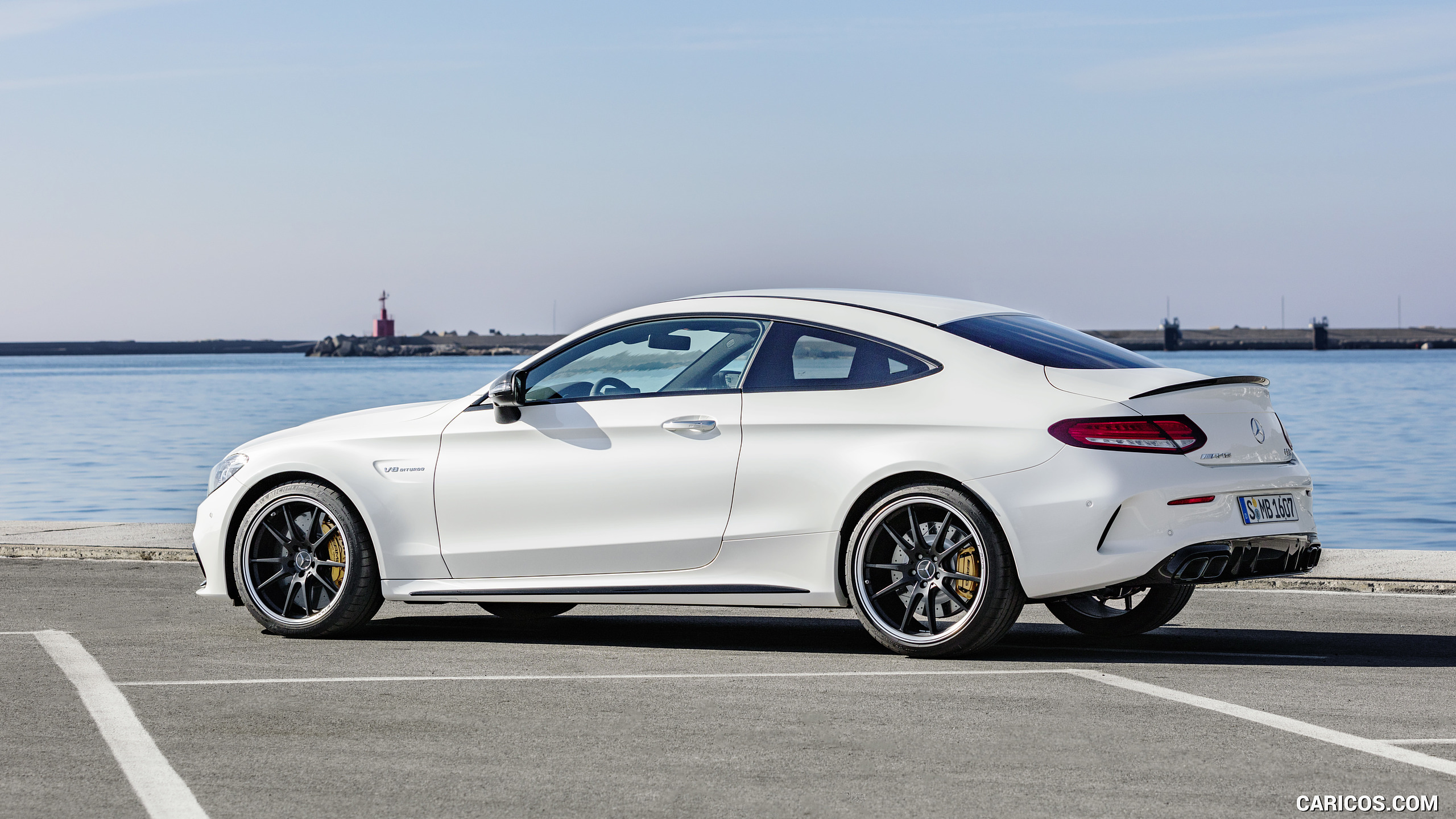 2019 Mercedes-AMG C 63 S Coupe with Night package and Carbon-package II (Color: Designo Diamond White Bright) - Side, #17 of 106