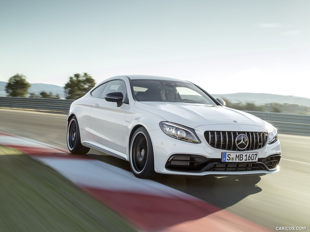 2019 Mercedes-AMG C 63 S Coupe with Night package and Carbon-package II (Color: Designo Diamond White Bright) - Front Three-Quarter