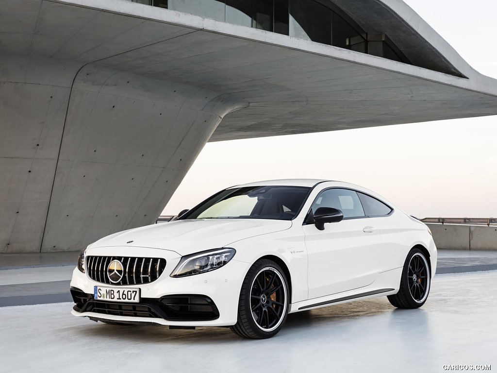 2019 Mercedes-AMG C 63 S Coupe with Night package and Carbon-package II (Color: Designo Diamond White Bright) - Front Three-Quarter