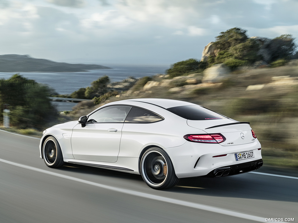 2019 Mercedes-AMG C 63 S Coupe with Night package and Carbon-package II (Color: Designo Diamond White Bright) - Rear Three-Quarter