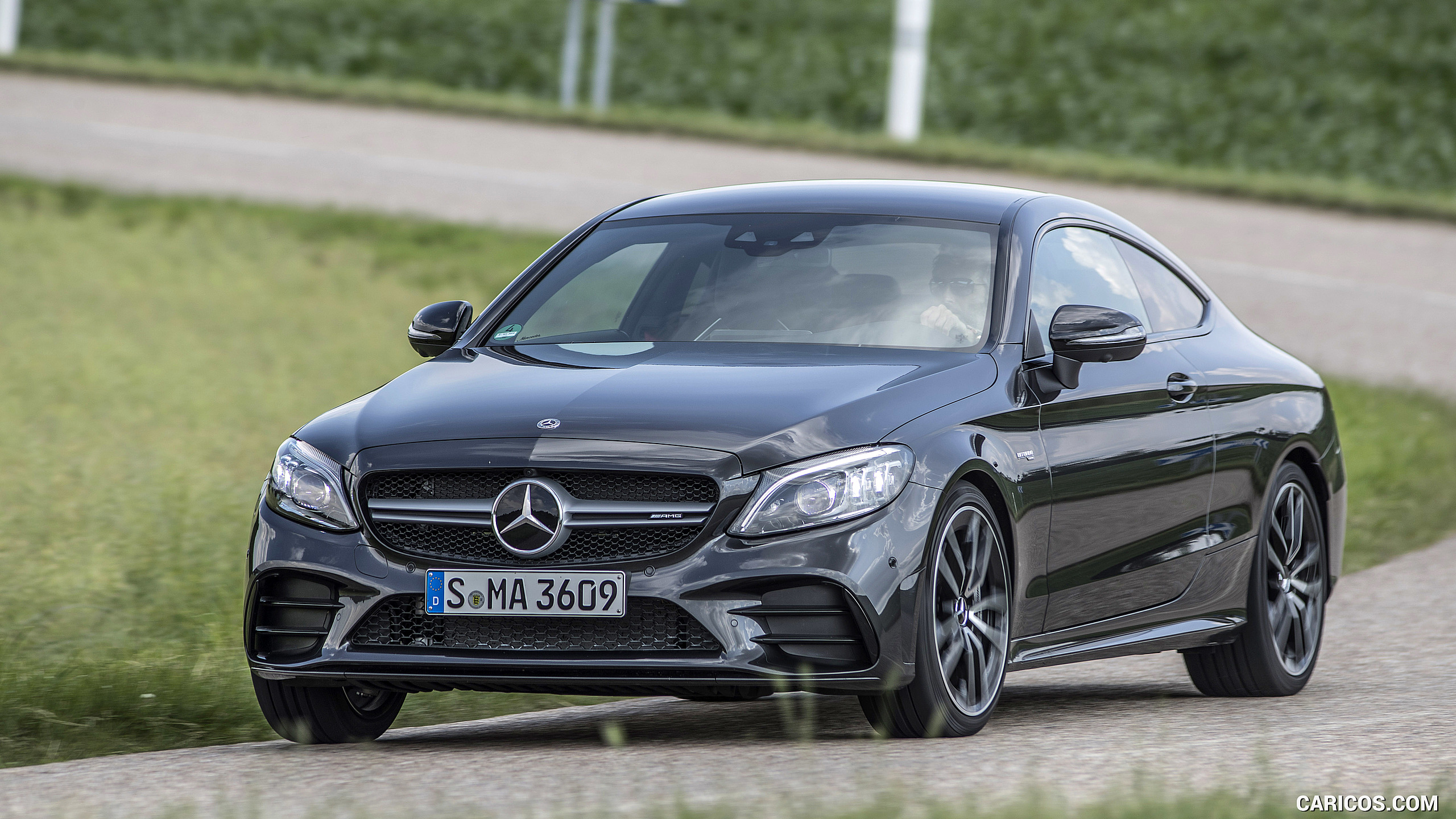 2019 Mercedes-AMG C43 4MATIC Coupe (Color: Graphite Grey Metallic) - Front Three-Quarter, #35 of 184