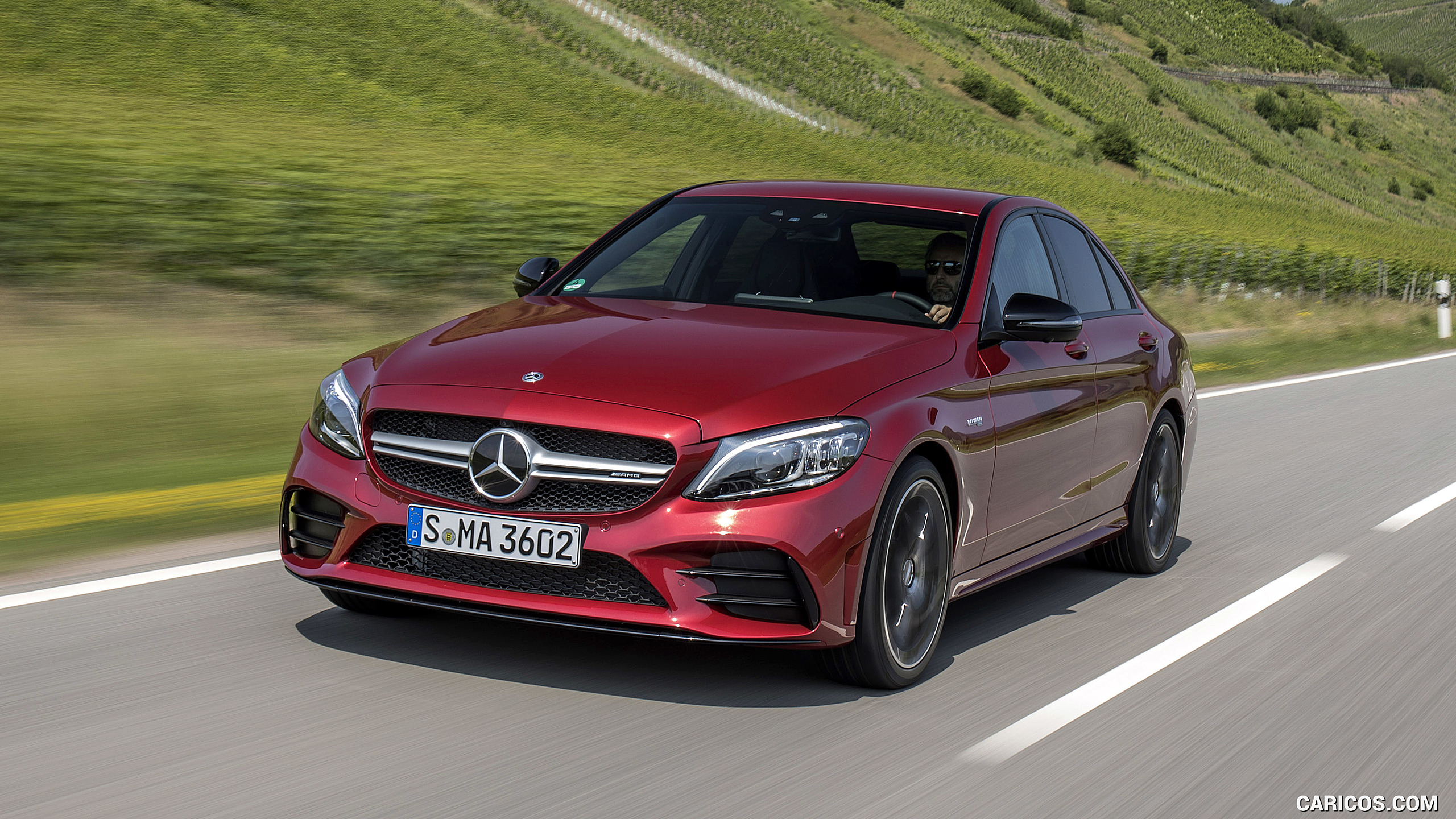 2019 Mercedes-AMG C43 4MATIC Sedan (Color: Hyacinth Red) - Front Three-Quarter, #32 of 192