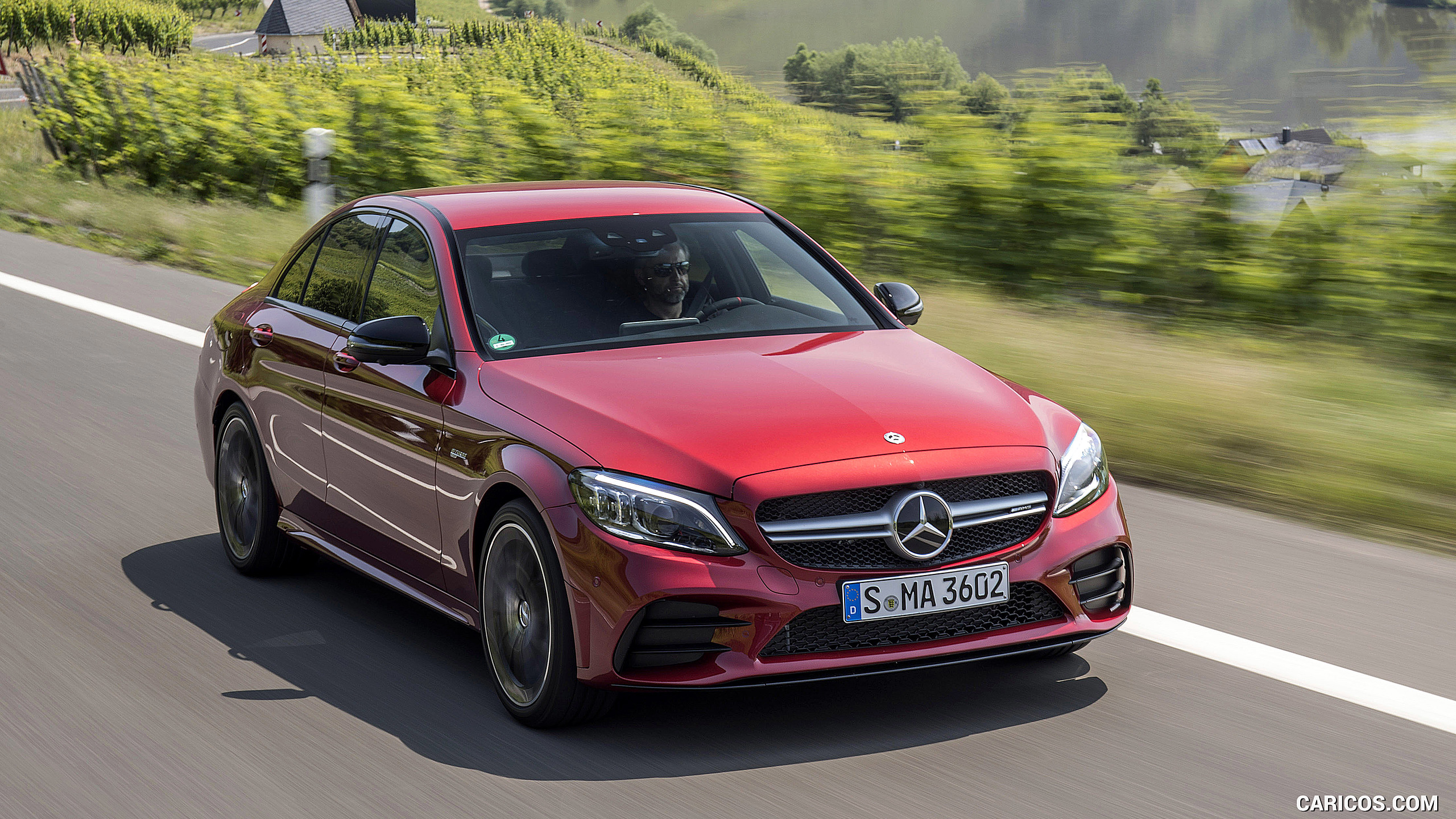 2019 Mercedes-AMG C43 4MATIC Sedan (Color: Hyacinth Red) - Front Three-Quarter, #33 of 192