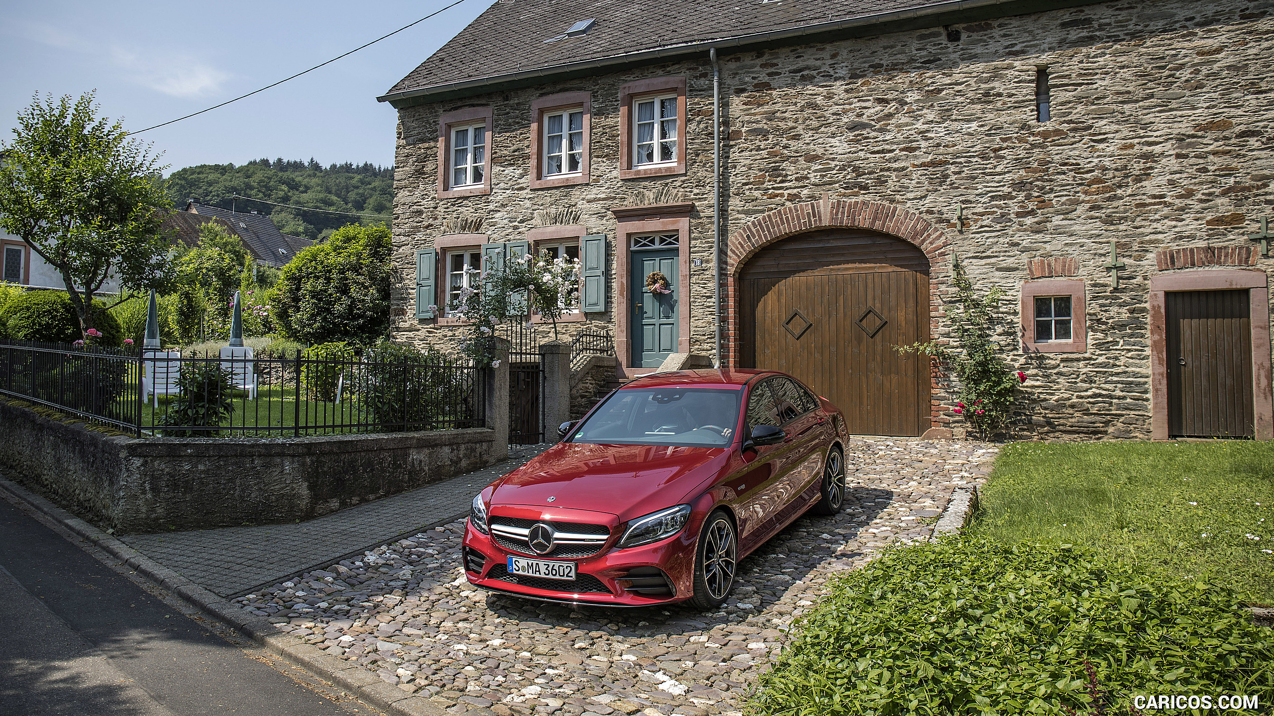 2019 Mercedes-AMG C43 4MATIC Sedan (Color: Hyacinth Red) - Front Three-Quarter, #60 of 192