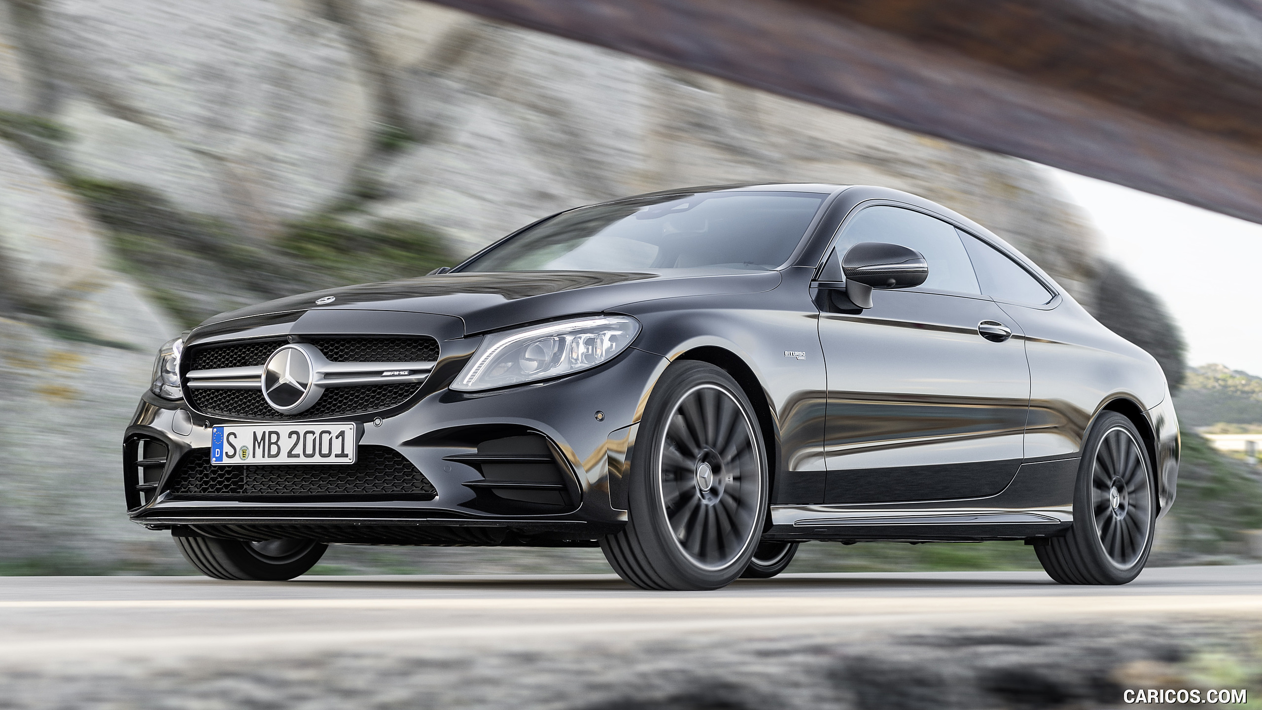 2019 Mercedes-AMG C43 Coupe 4MATIC Night Package and AMG Carbon-Package II (Color: Obsidian Black Metallic) - Front Three-Quarter, #9 of 184