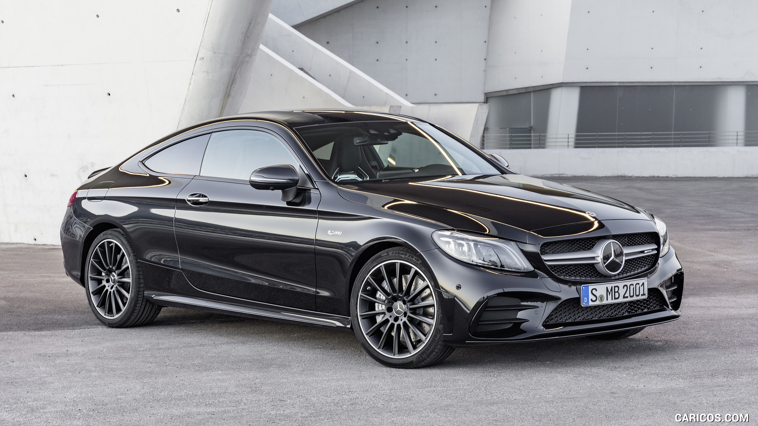 2019 Mercedes-AMG C43 Coupe 4MATIC Night Package and AMG Carbon-Package II (Color: Obsidian Black Metallic) - Front Three-Quarter, #19 of 184