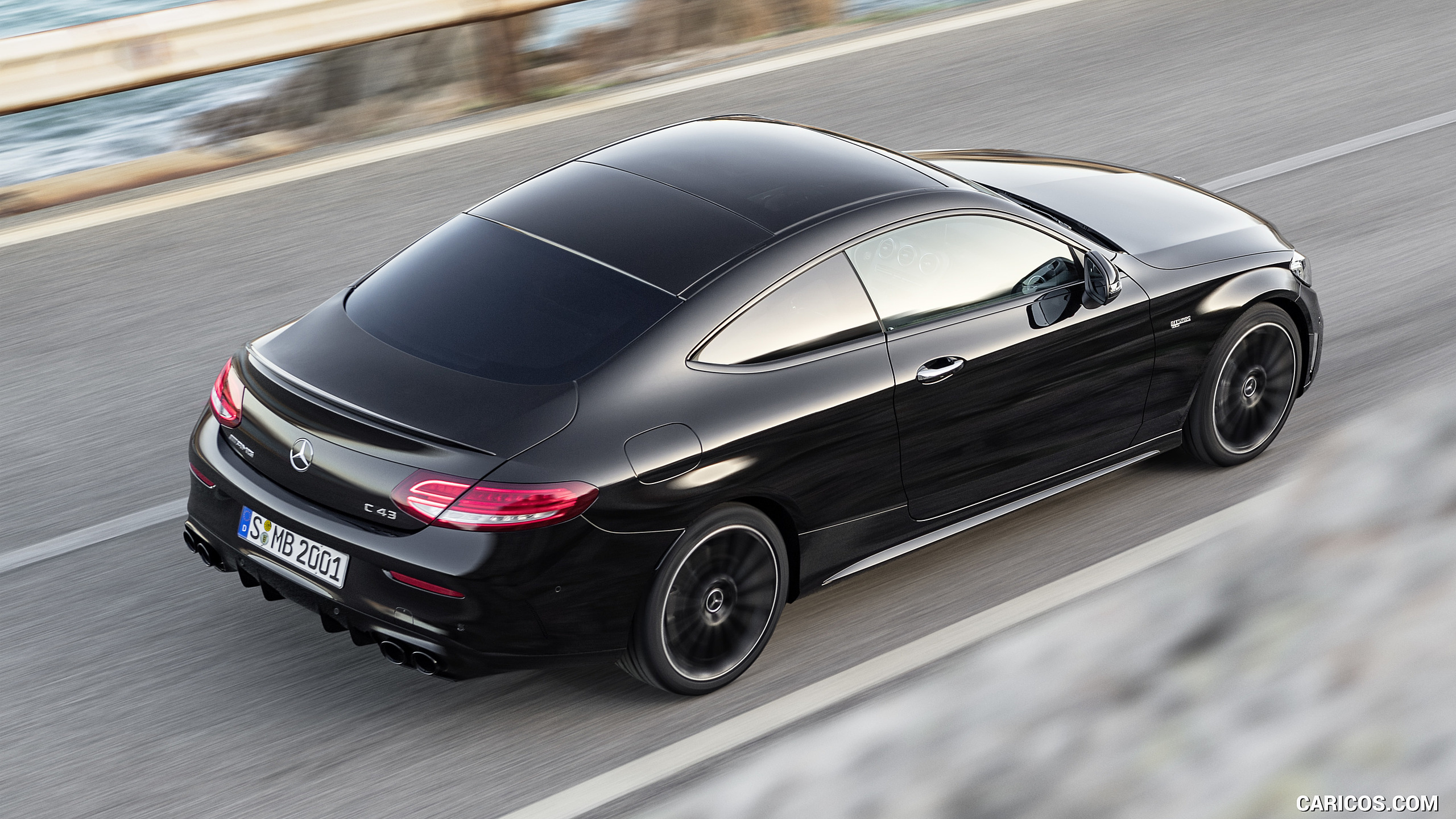 2019 Mercedes-AMG C43 Coupe 4MATIC Night Package and AMG Carbon-Package II (Color: Obsidian Black Metallic) - Rear Three-Quarter, #11 of 184