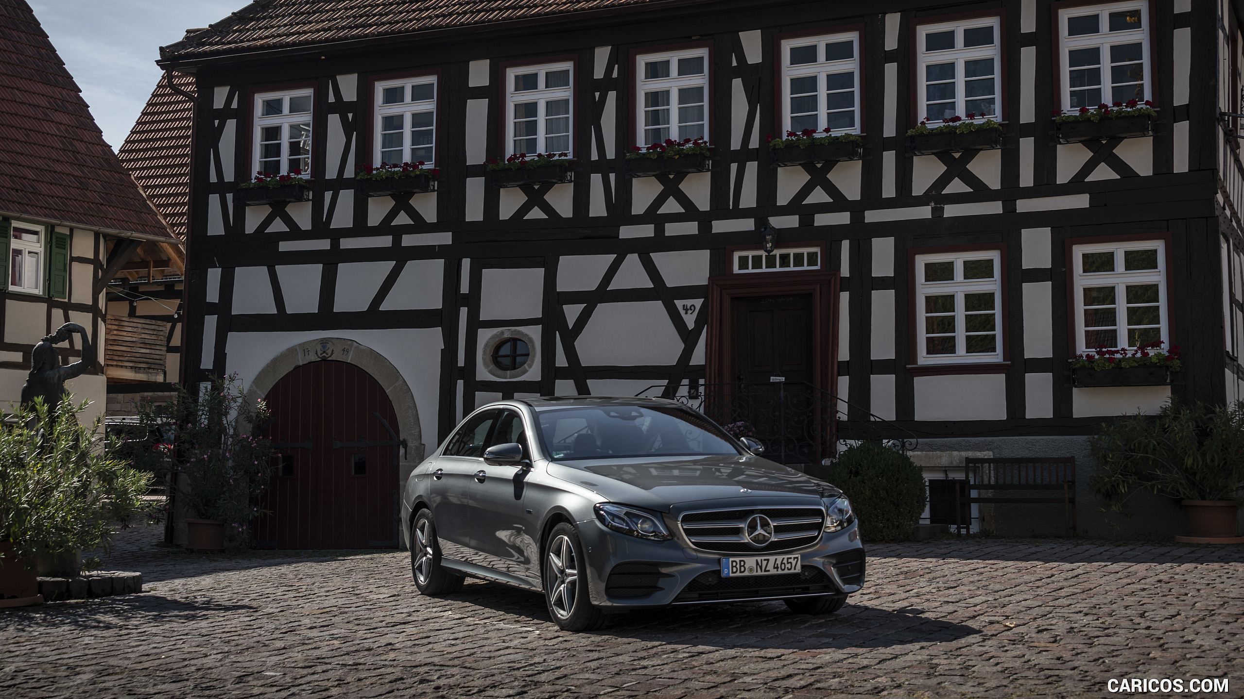 2019 Mercedes-Benz E 300 e Plug-in Hybrid Sedan (Color: Selenite Grey Metallic) - Front Three-Quarter, #15 of 71