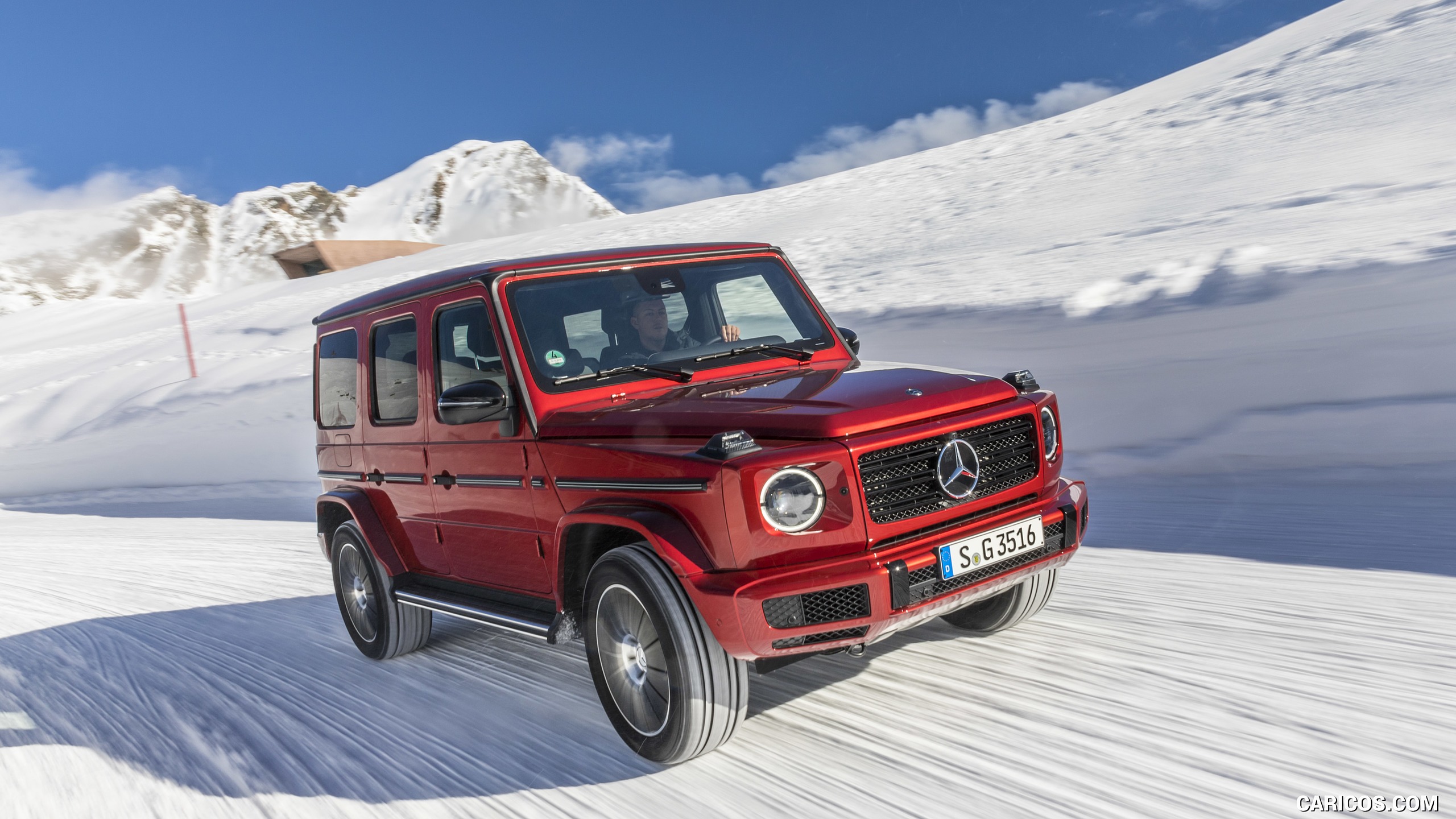 2019 Mercedes-Benz G 350 d (Designo Hyazinth Red Metallic) - In Snow - Front Three-Quarter, #3 of 51