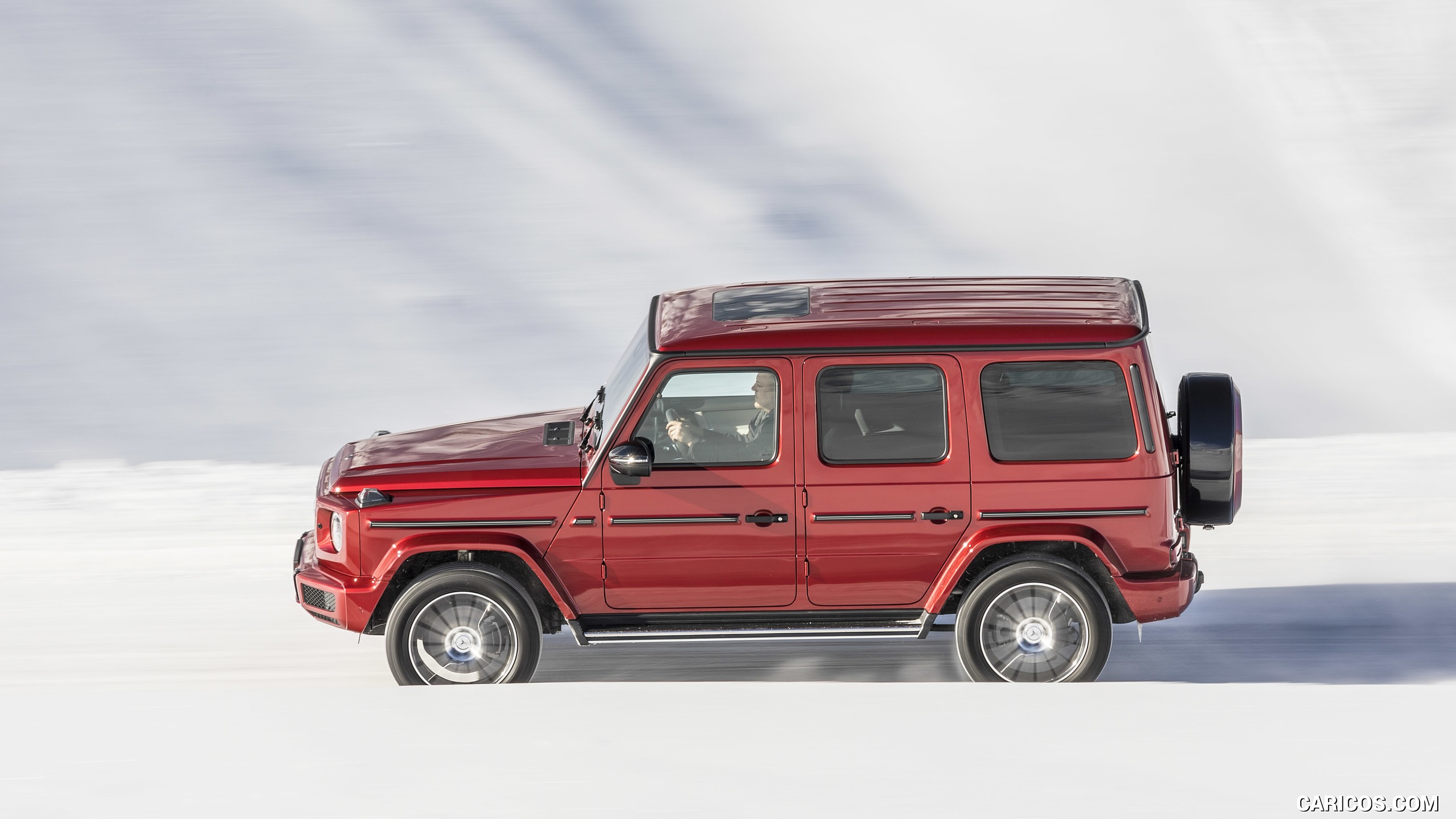 2019 Mercedes-Benz G 350 d (Designo Hyazinth Red Metallic) - In Snow - Side, #5 of 51