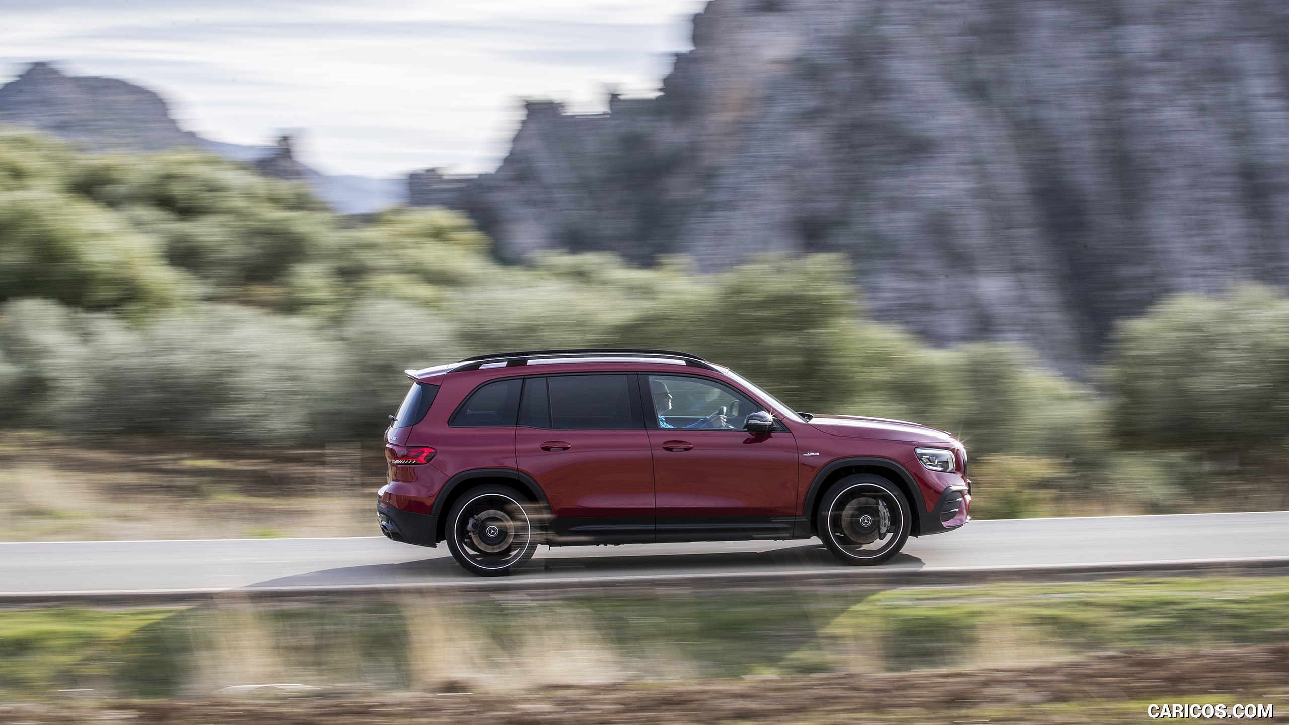 2021 Mercedes-AMG GLB 35 4MATIC (Color: Designo Patagonia Red Metallic) - Side, #30 of 95