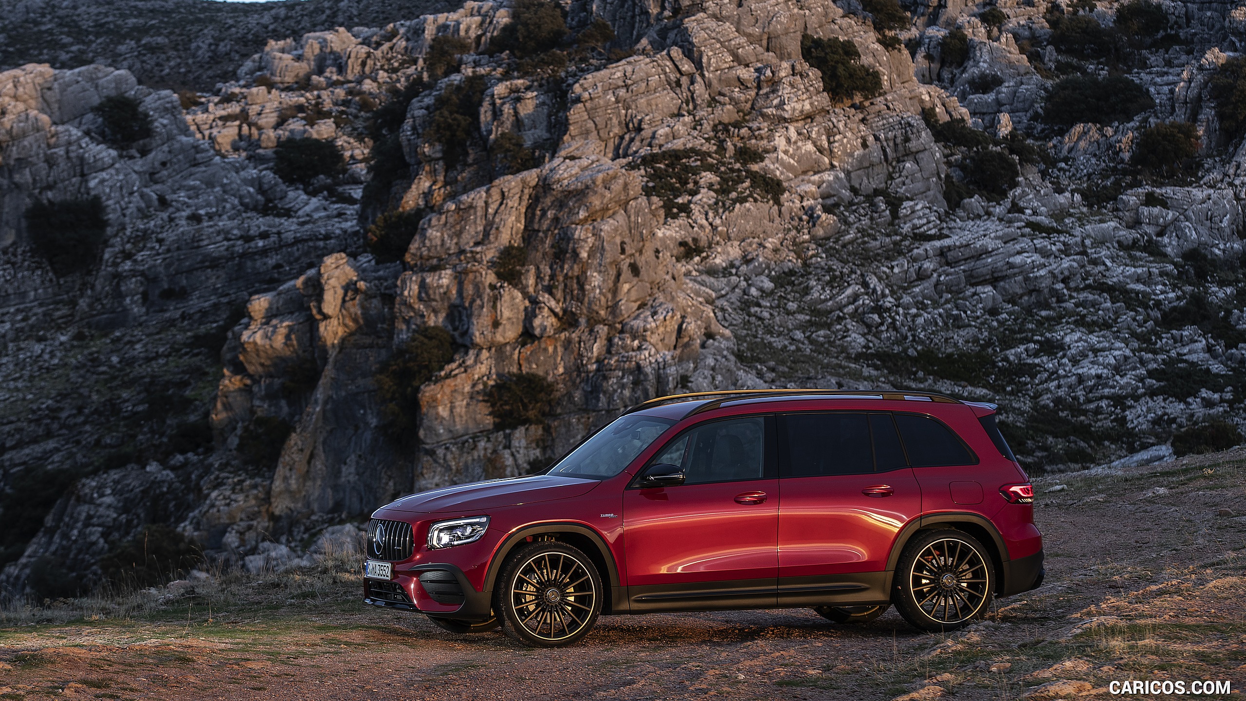 2021 Mercedes-AMG GLB 35 4MATIC (Color: Designo Patagonia Red Metallic) - Side, #37 of 95