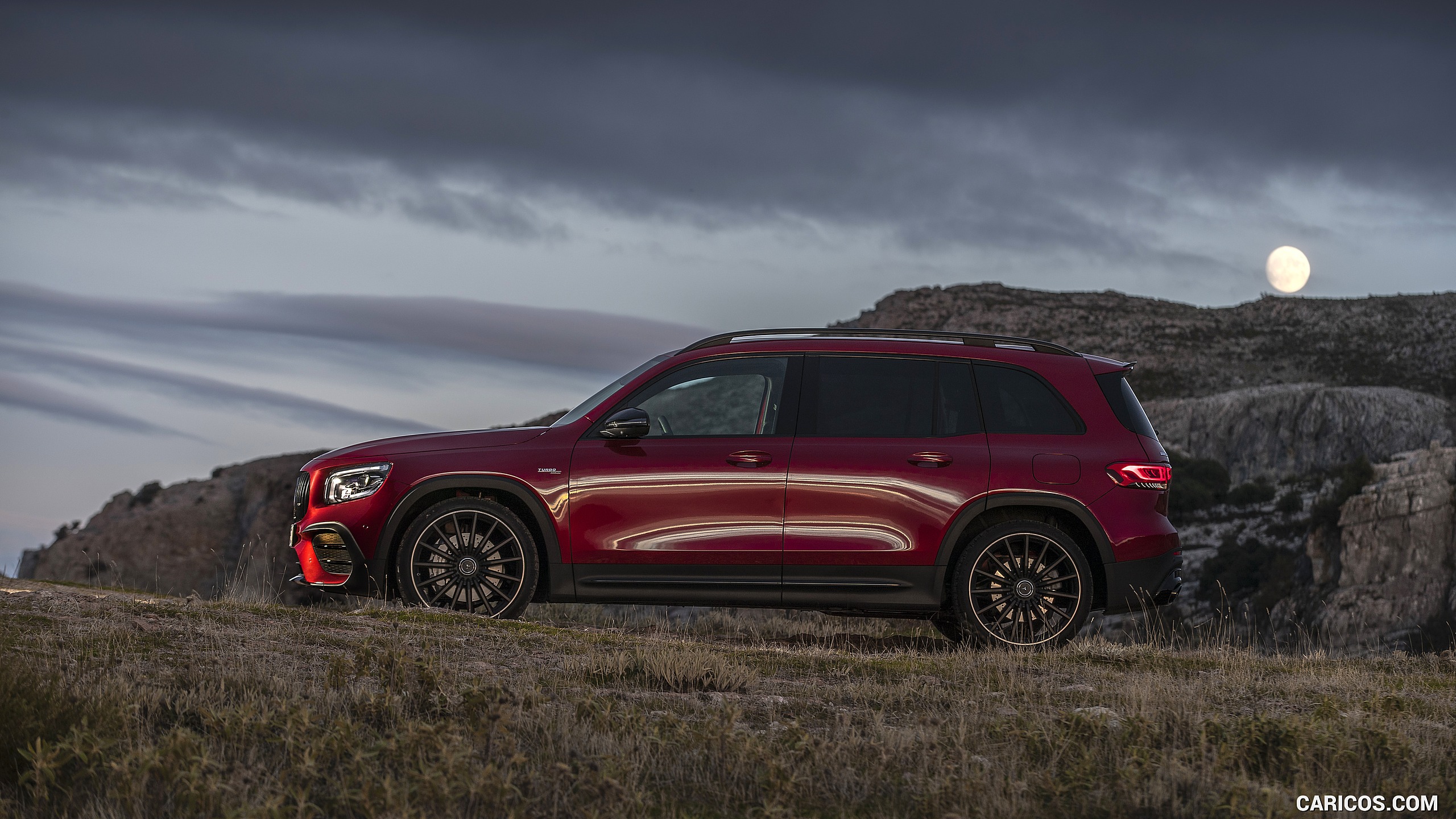 2021 Mercedes-AMG GLB 35 4MATIC (Color: Designo Patagonia Red Metallic) - Side, #38 of 95
