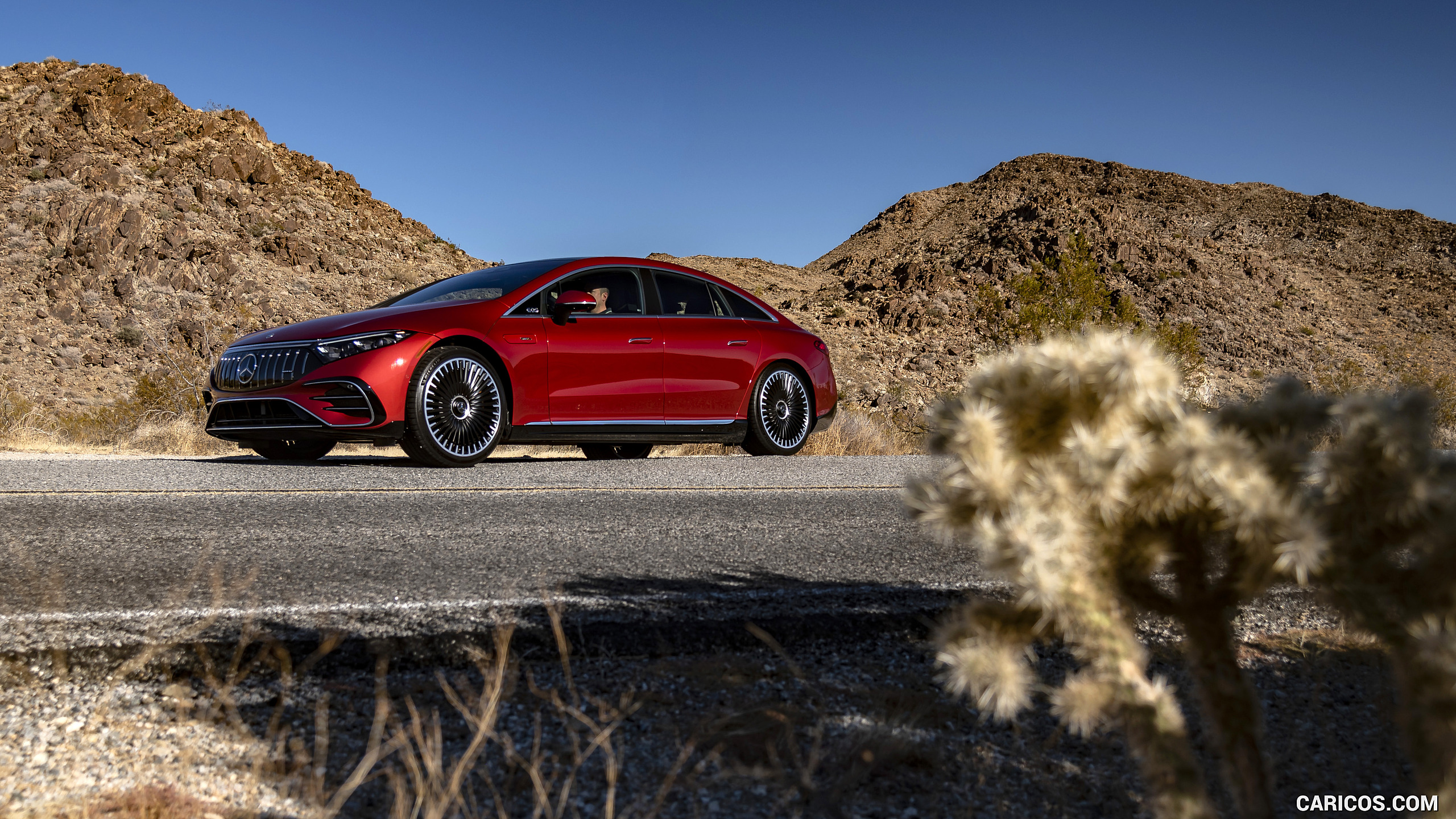 2022 Mercedes-AMG EQS 53 4MATIC+ (Color: Hyazinth Red Metallic) - Front Three-Quarter, #52 of 76