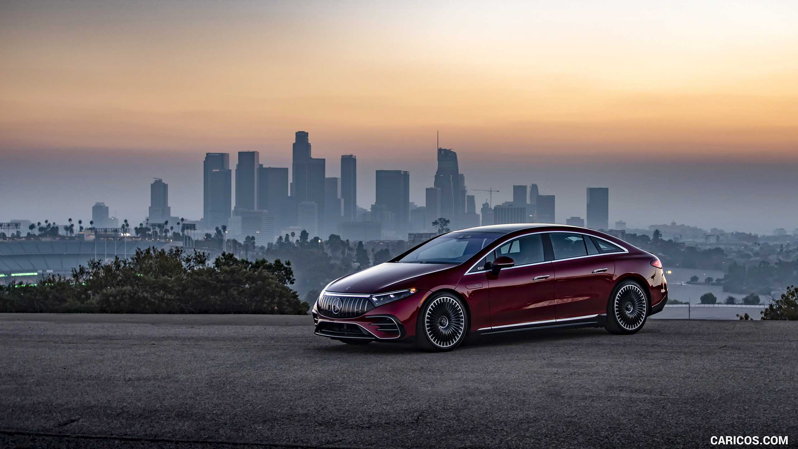 2022 Mercedes-AMG EQS 53 4MATIC+ (Color: Hyazinth Red Metallic) - Front Three-Quarter, #61 of 76