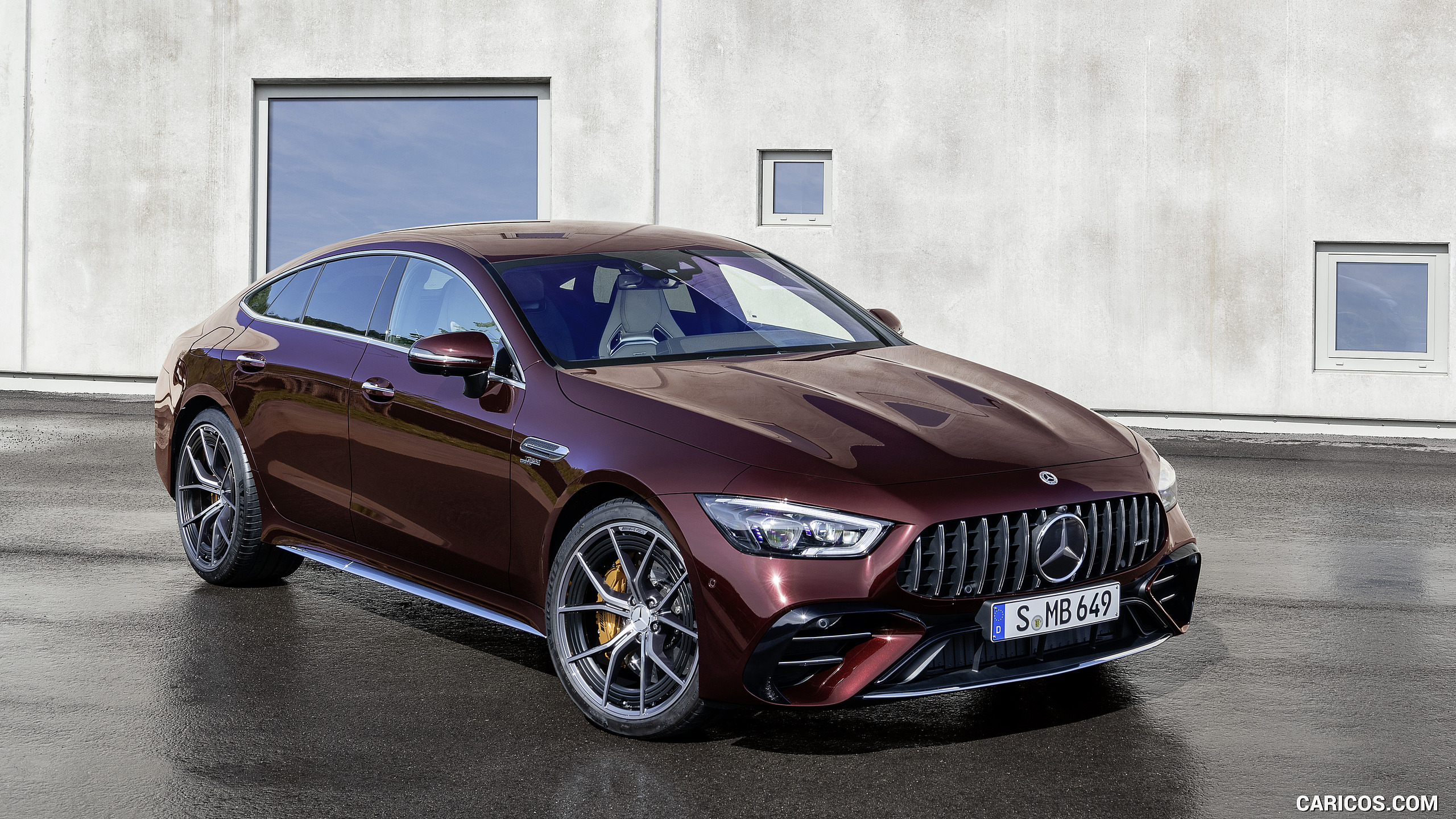 2022 Mercedes-AMG GT 53 4MATIC+ 4-Door Coupe (Color: Rubellite Red) - Front Three-Quarter, #5 of 35