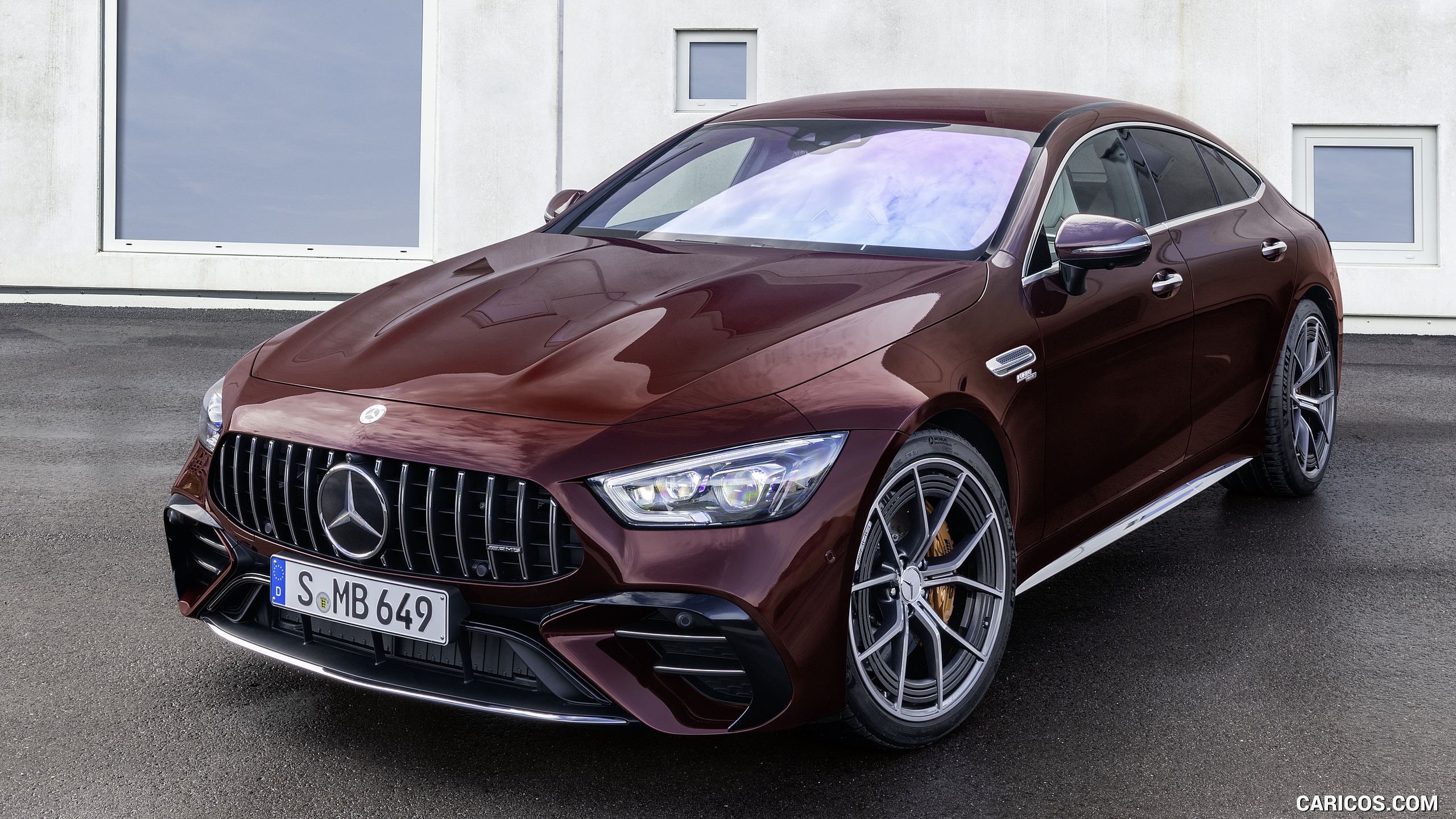 2022 Mercedes-AMG GT 53 4MATIC+ 4-Door Coupe (Color: Rubellite Red) - Front Three-Quarter, #9 of 35