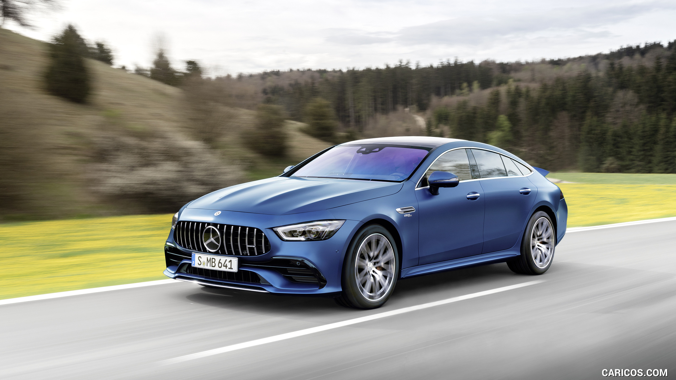 2022 Mercedes-AMG GT 53 4MATIC+ 4-Door Coupe (Color: Spectrale Blue Magno) - Front Three-Quarter, #18 of 35