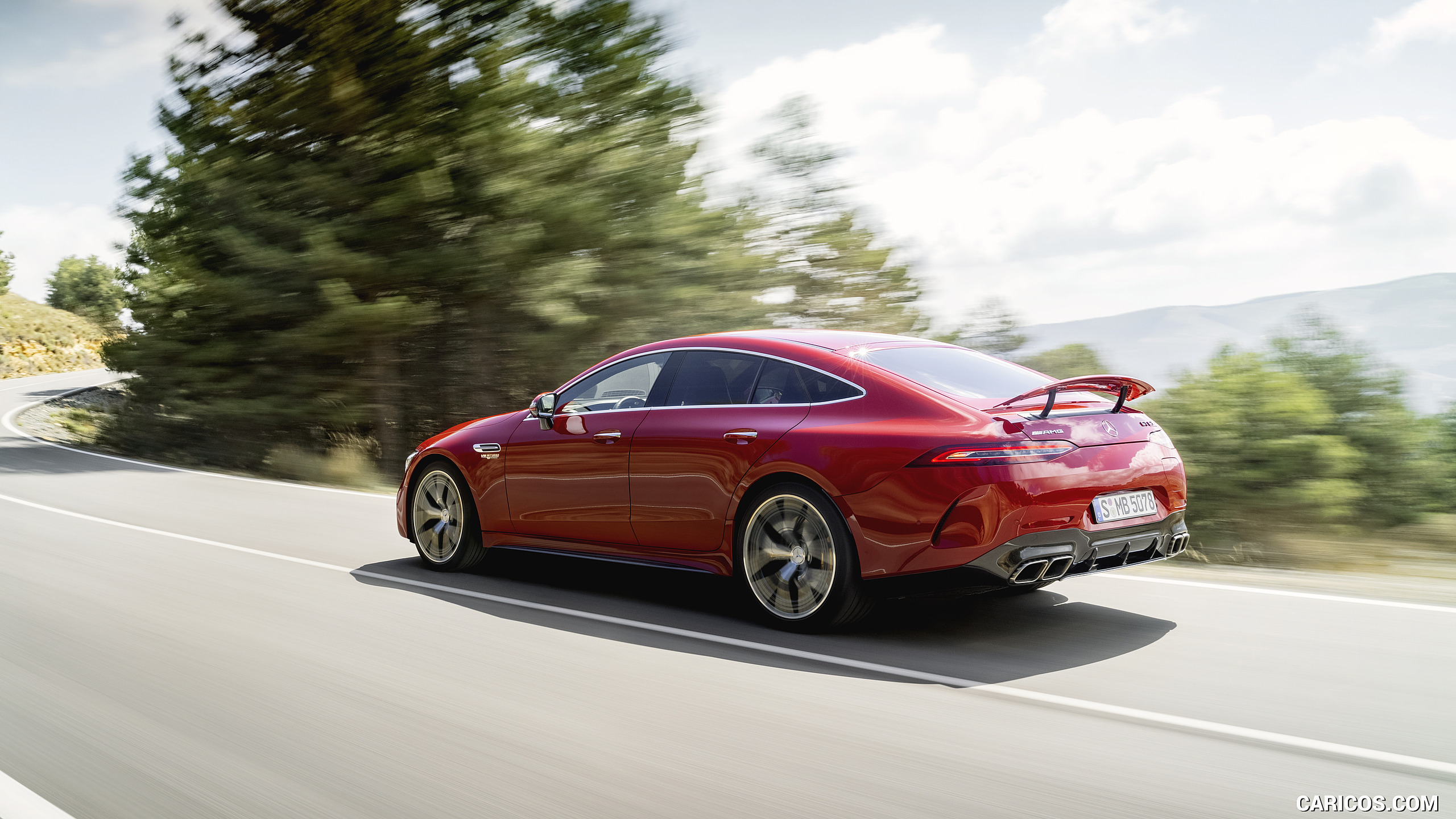2022 Mercedes-AMG GT 63 S E Performance 4MATIC+ (Color: Jupiter Red) - Rear Three-Quarter, #3 of 88