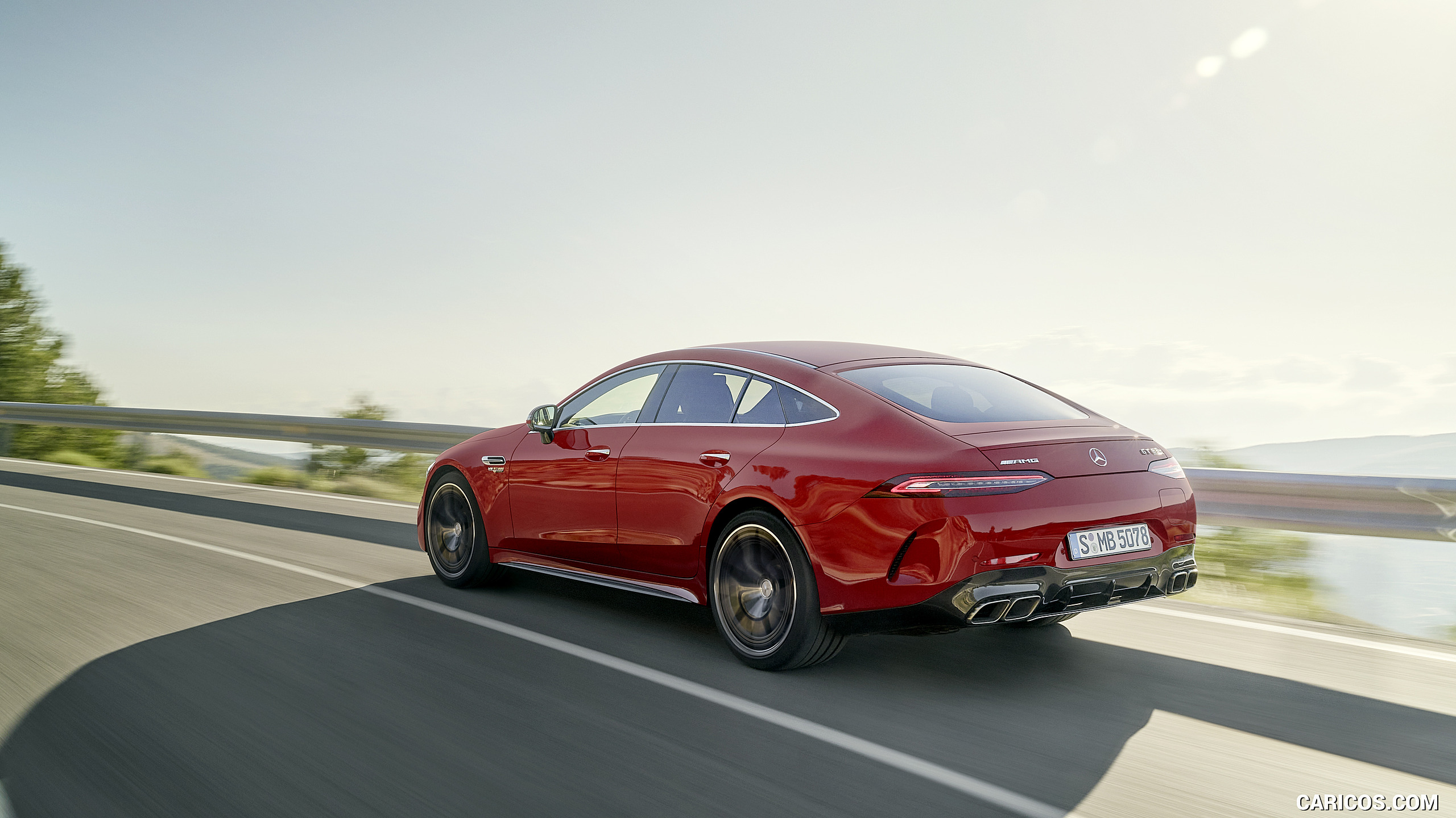 2022 Mercedes-AMG GT 63 S E Performance 4MATIC+ (Color: Jupiter Red) - Rear Three-Quarter, #5 of 88