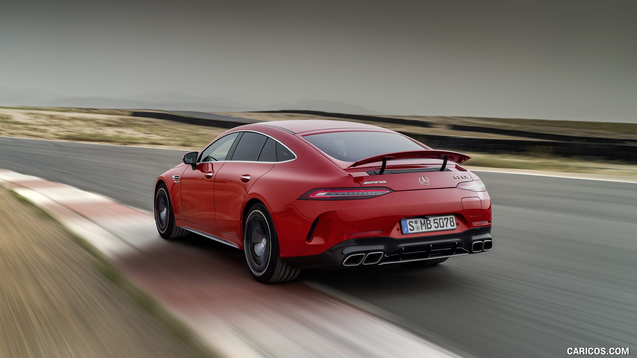 2022 Mercedes-AMG GT 63 S E Performance 4MATIC+ (Color: Jupiter Red) - Rear Three-Quarter, #16 of 88