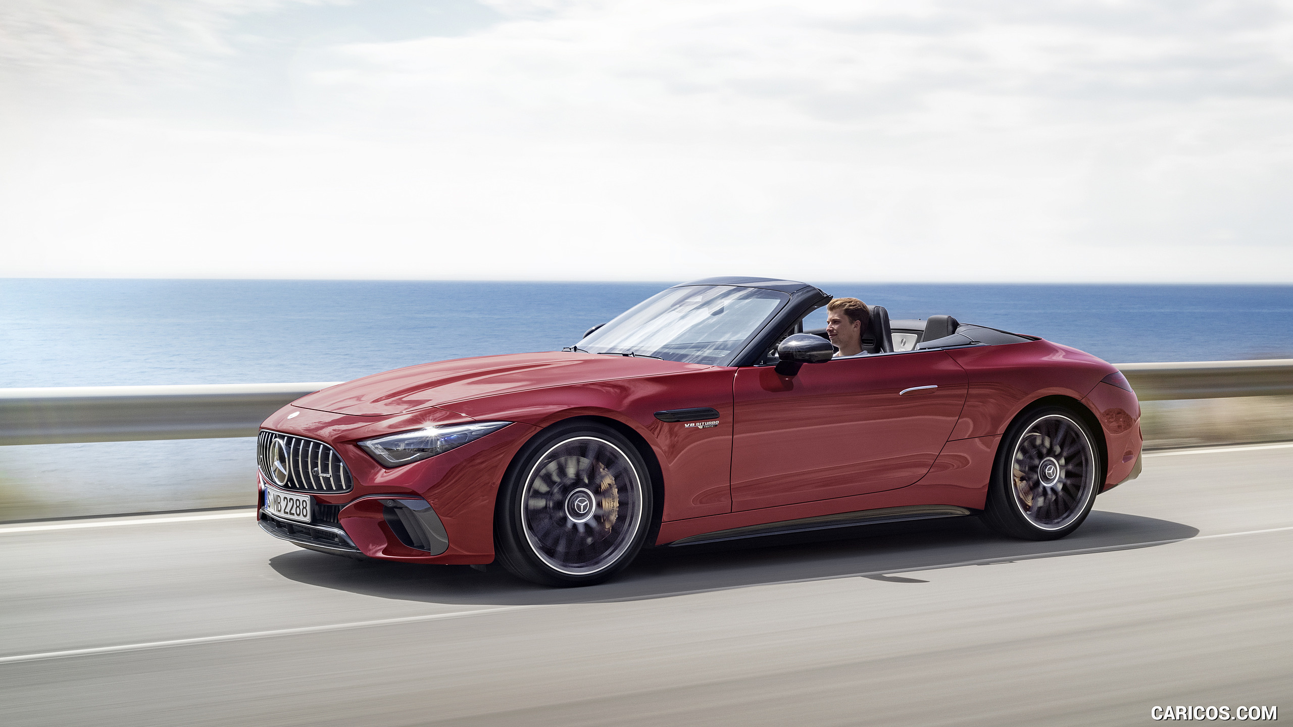 2022 Mercedes-AMG SL 63 4MATIC+ (Color: Patagonia Red Metallic) - Front Three-Quarter, #6 of 235
