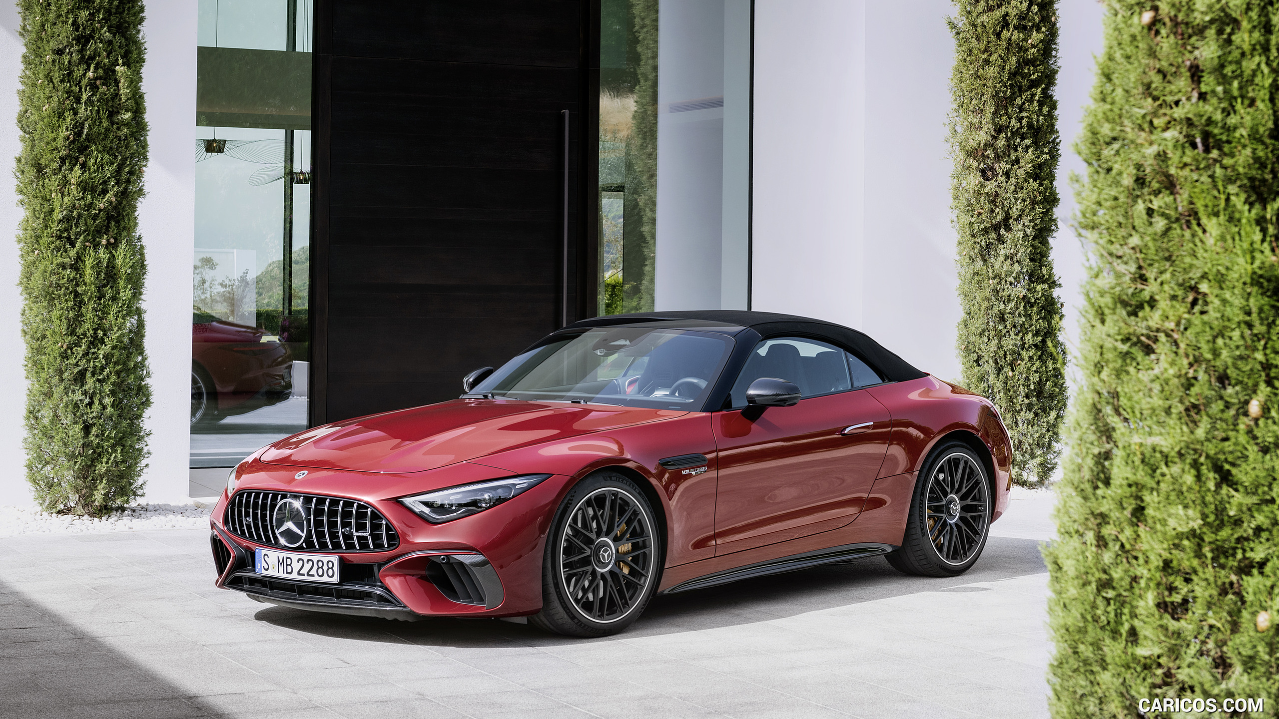 2022 Mercedes-AMG SL 63 4MATIC+ (Color: Patagonia Red Metallic) - Front Three-Quarter, #11 of 235