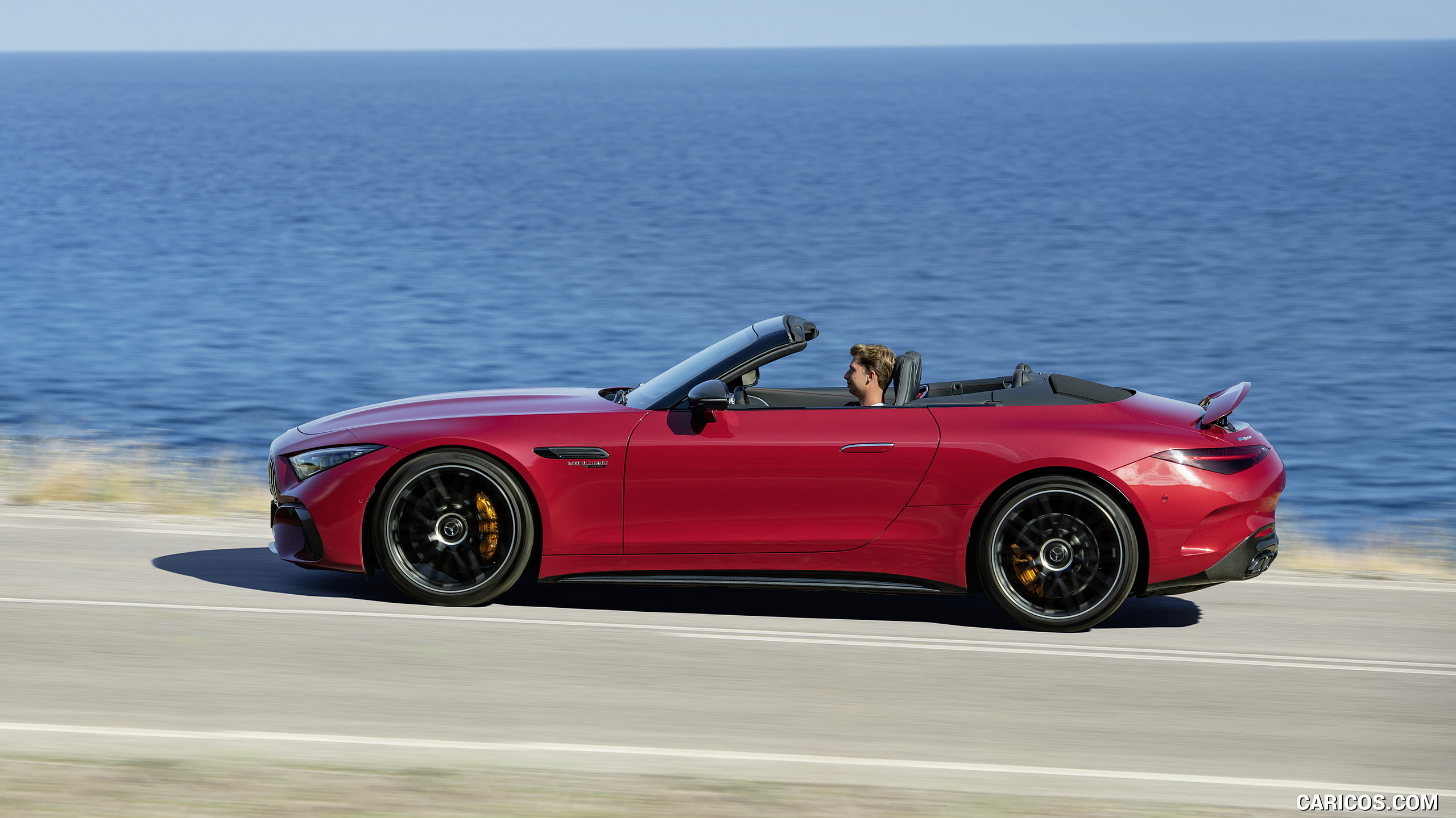 2022 Mercedes-AMG SL 63 4MATIC+ (Color: Patagonia Red Metallic) - Side, #2 of 235