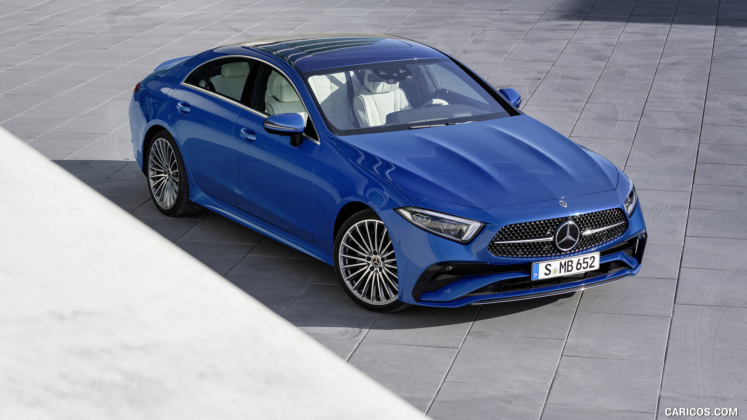 2022 Mercedes-Benz CLS AMG Line (Color: Spectral Blue Metallic) - Front Three-Quarter, #16 of 36