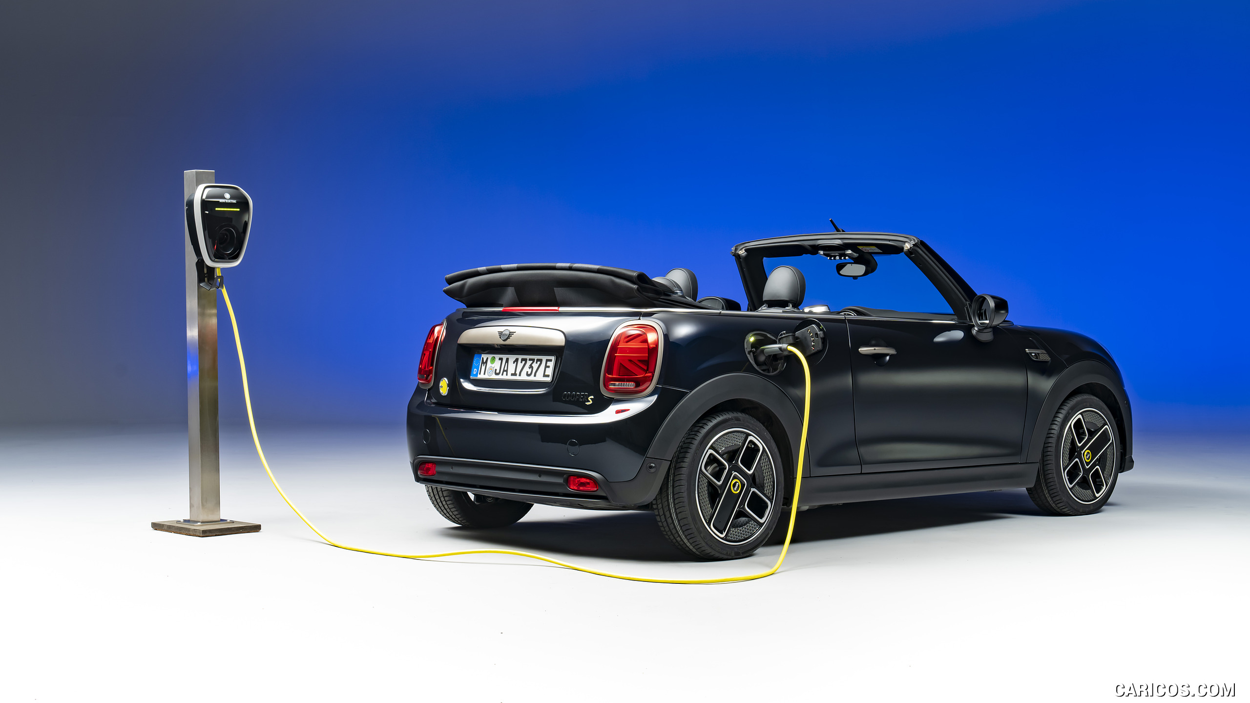 2023 MINI Cooper SE Convertible (Color: Enigmatic Black) - Rear Three-Quarter, #202 of 225