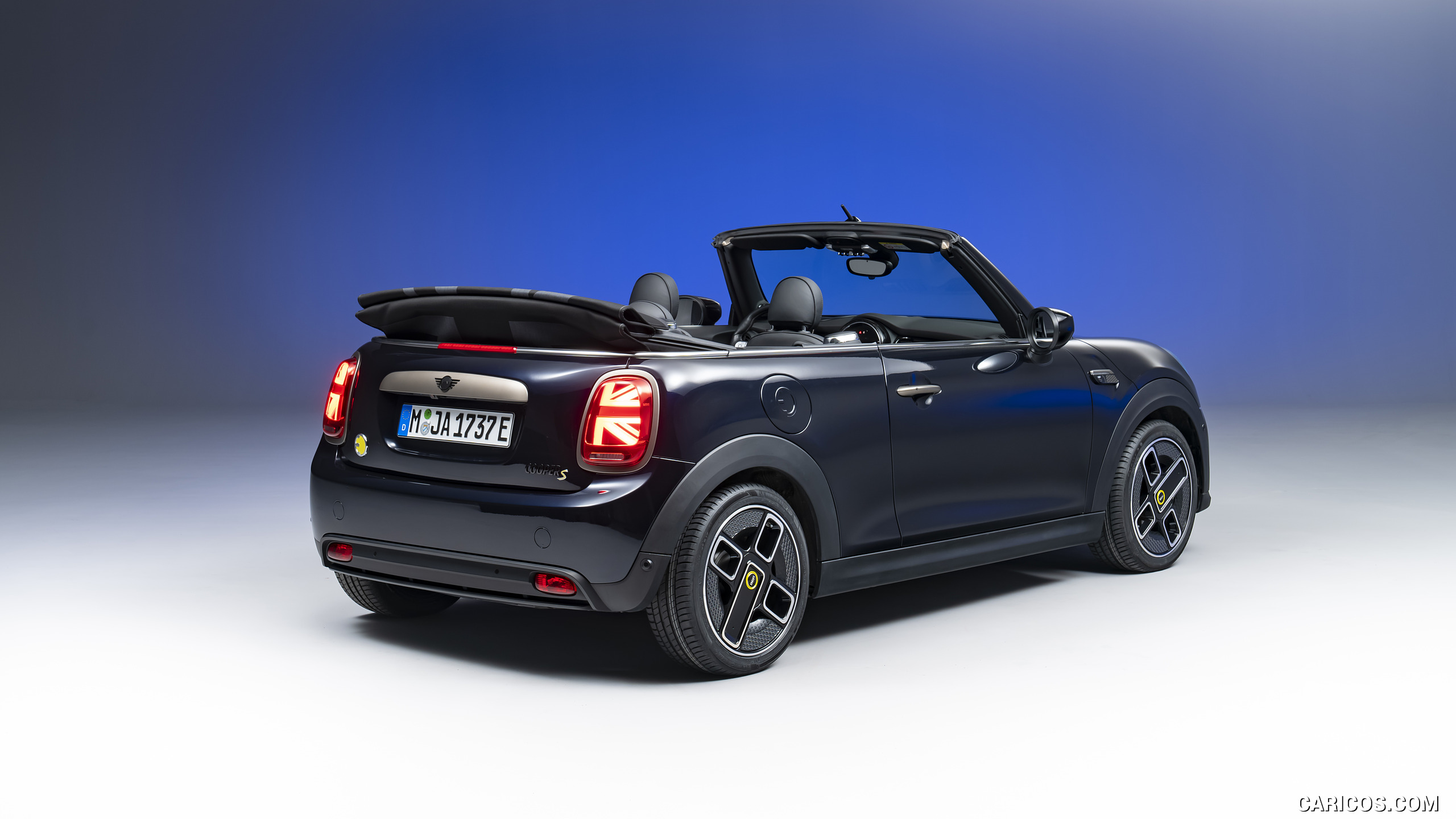 2023 MINI Cooper SE Convertible (Color: Enigmatic Black) - Rear Three-Quarter, #203 of 225